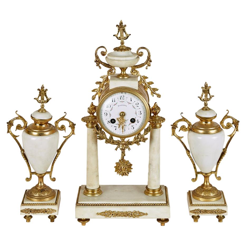 French Louis XVI Style White Marble and Gilt Metal Mounted Clock Set