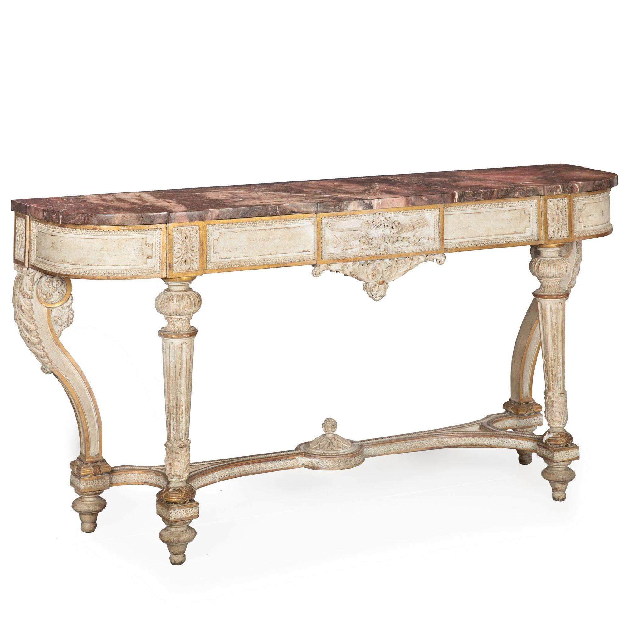 FRENCH LOUIS XVI CARVED WHITE-PAINTED PARCEL-GILT CONSOLE TABLE WITH VIOLET MARBLE TOP
Circa late 19th century
Item # 306YPZ14Q

A wonderful late 19th century carved console, the table notably retains the original and positively stunning violet
