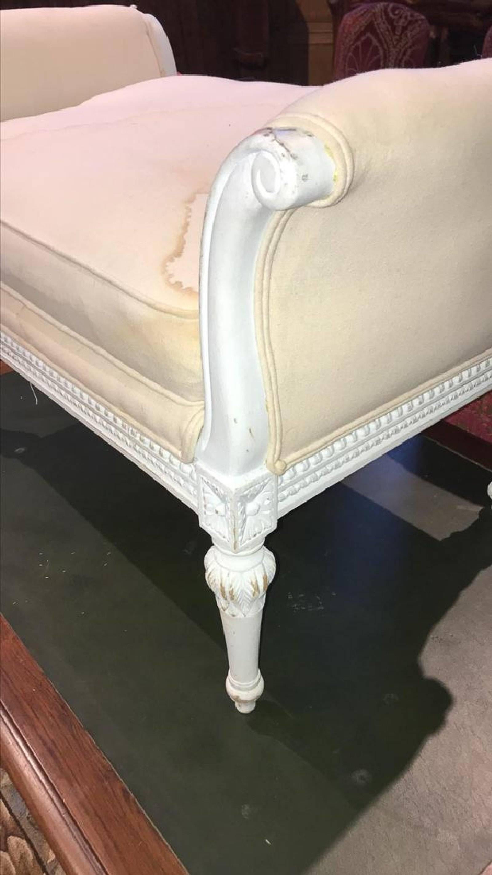 Beautifully fashioned French Louis XVI style painted and upholstered roll arm window seat or bench, circa 1940. 

Classic vintage piece ready for your fabric.

Structurally sound and intact. 

Size: Height 21