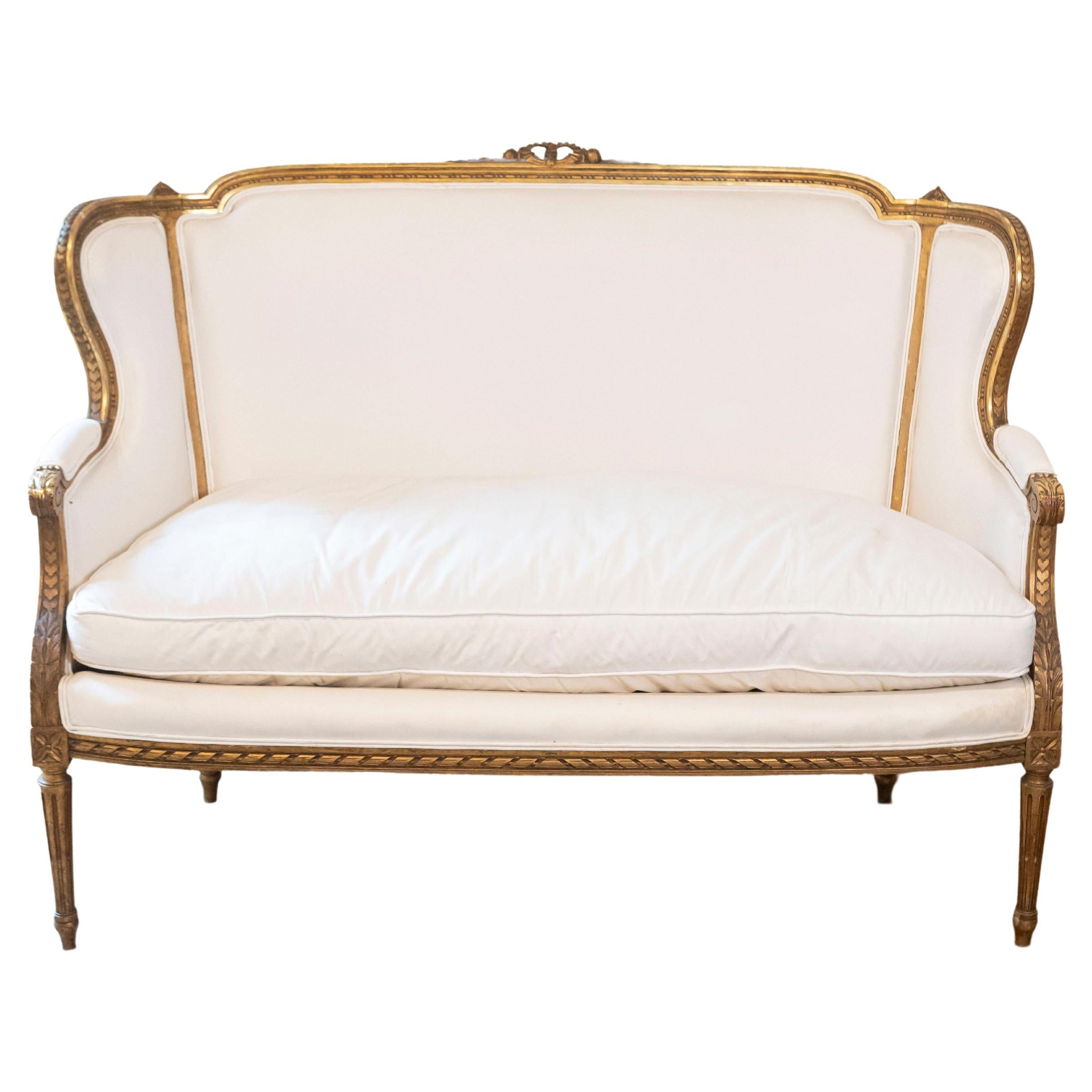 French Louis XVI Style Wingback Settee with Original Gilding and New Fabric