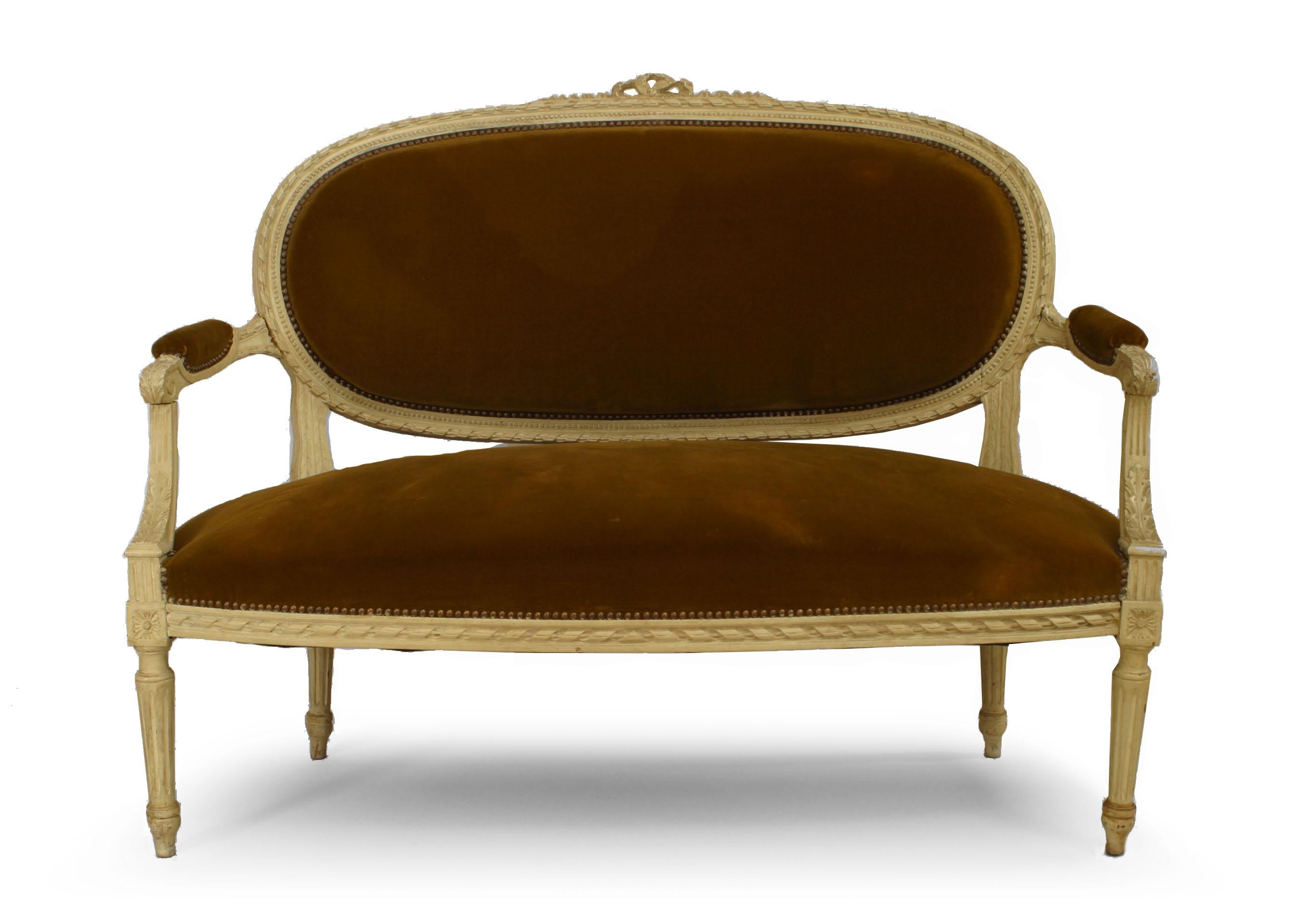 French Louis XVI style cream painted loveseat with bow knot carved back crest and velvet upholstered seat and back.