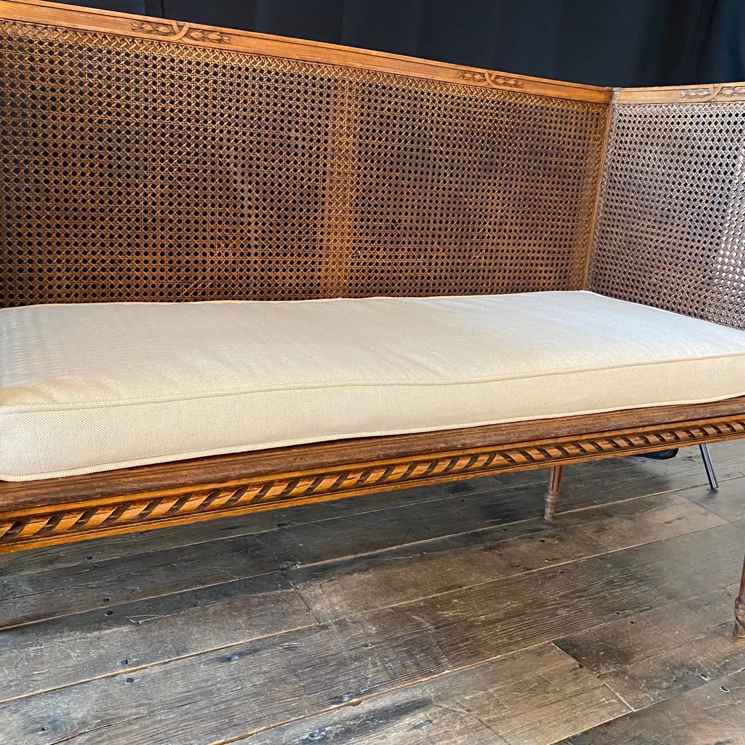 French Louis XVI Walnut and Double Caned Loveseat In Good Condition For Sale In Hopewell, NJ