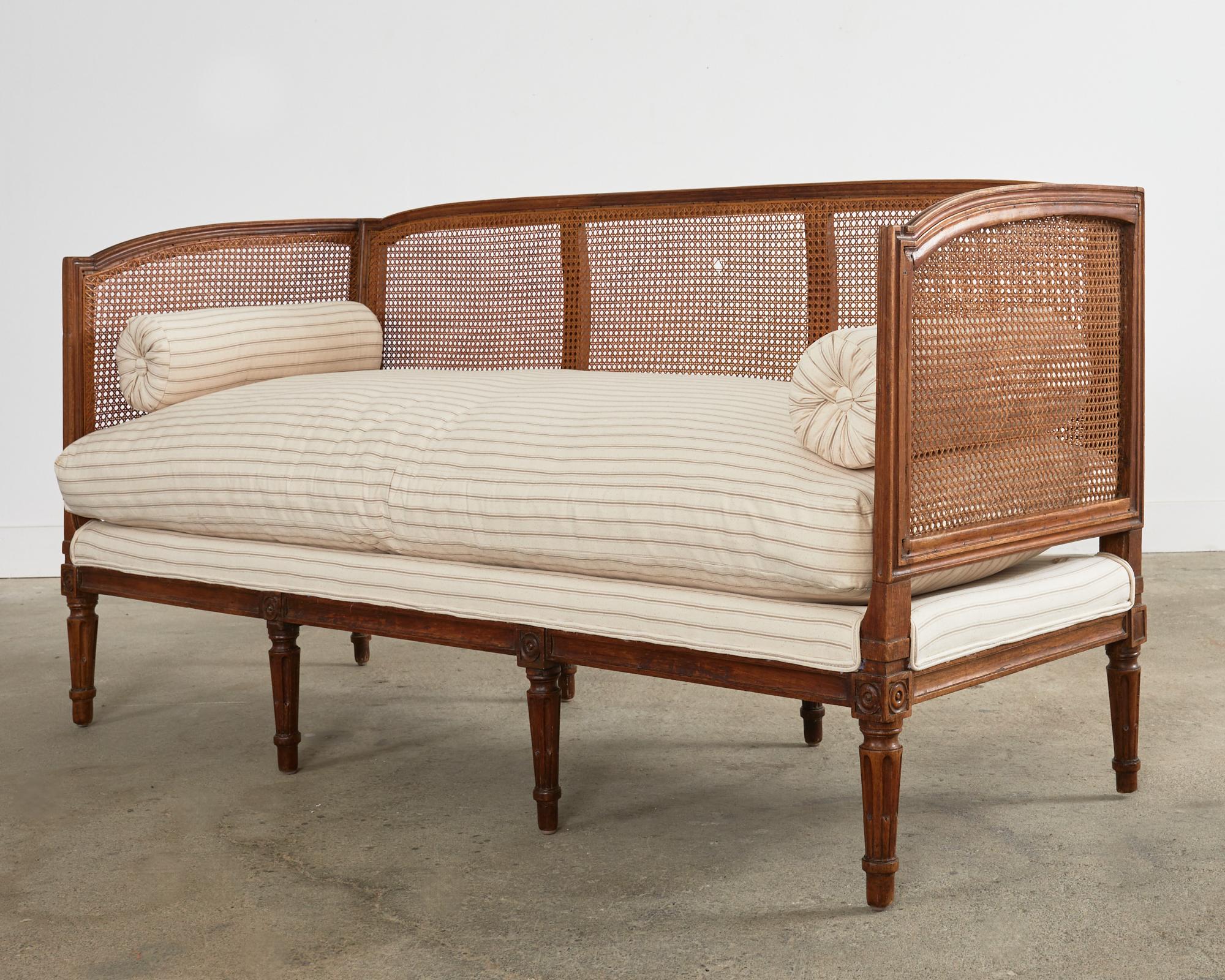 Hand-Carved French Louis XVI Walnut Cane Sofa Settee Daybed Canapè