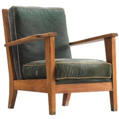 French Lounge Chair in Carved Solid Oak and Dark Green Upholstery