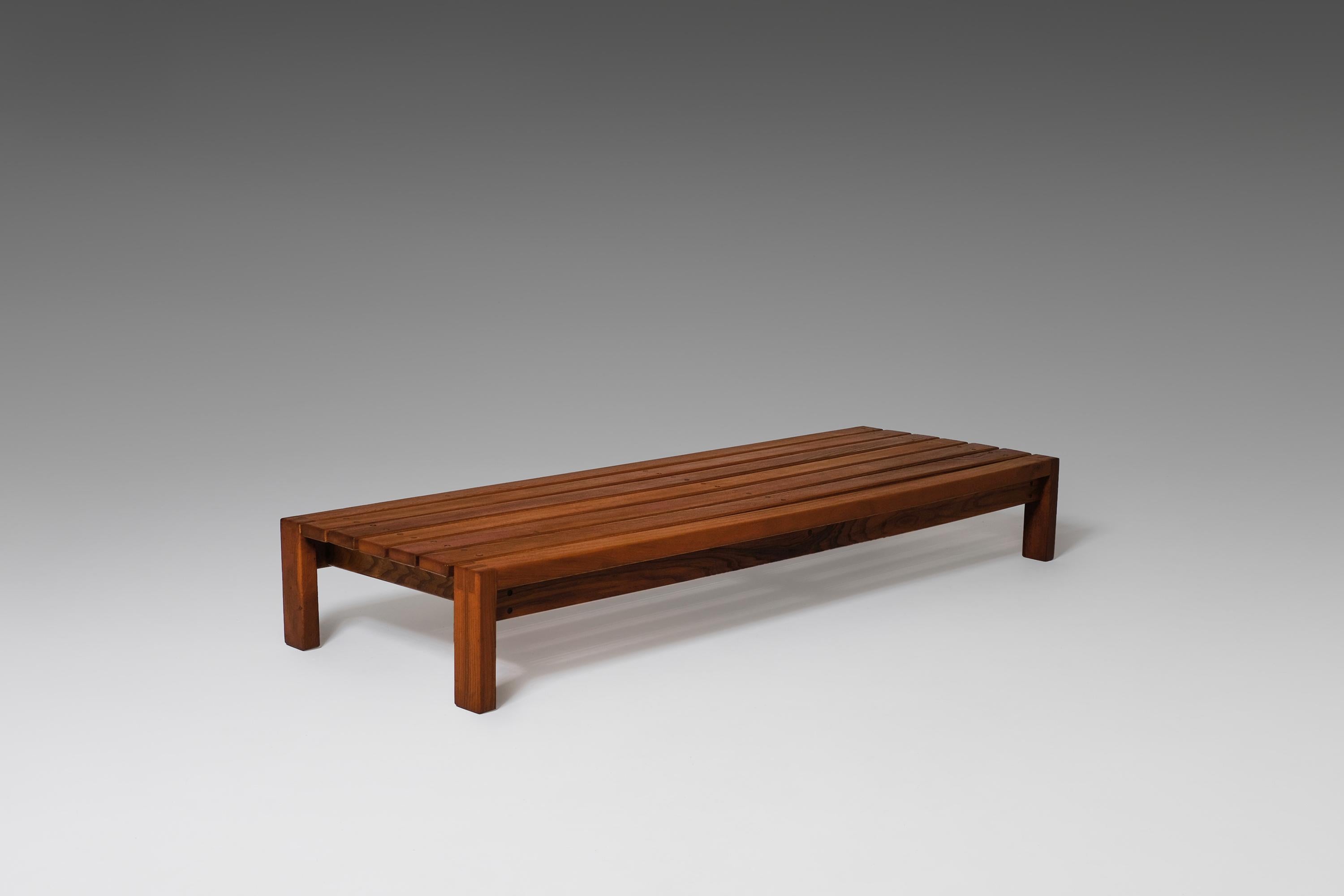 Solid elm bench or large coffee table in the style of Pierre Chapo, France, 1960s. Made of solid warm colored elmwood with a beautiful exposed grain, giving the bench a rich, warm and natural appearance. All handcrafted with great details showing