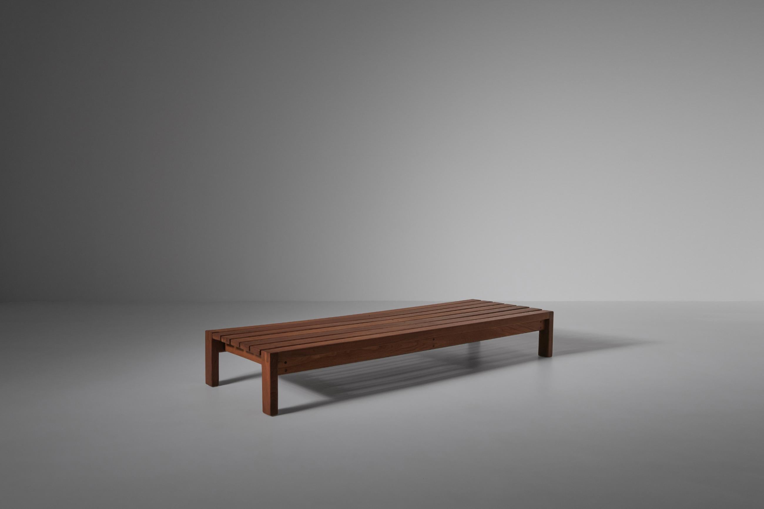 Solid Elm bench or large coffee table in the style of Pierre Chapo, France 1960s. Made of solid warm colored Elmwood with a beautiful exposed grain, giving the bench a rich, warm and natural appearance. All handcrafted with great details showing the