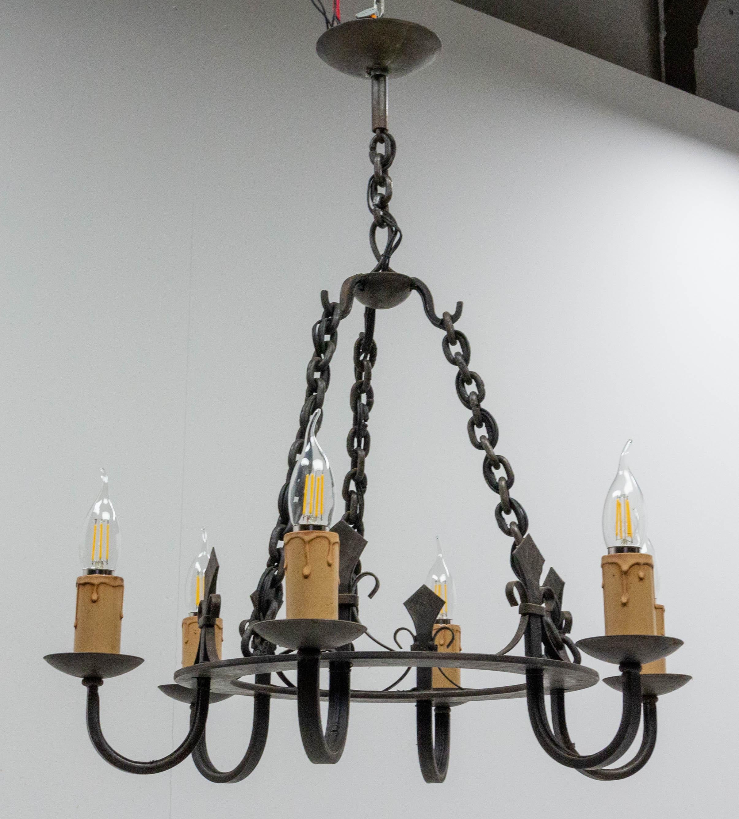 wrought iron chandelier with candles