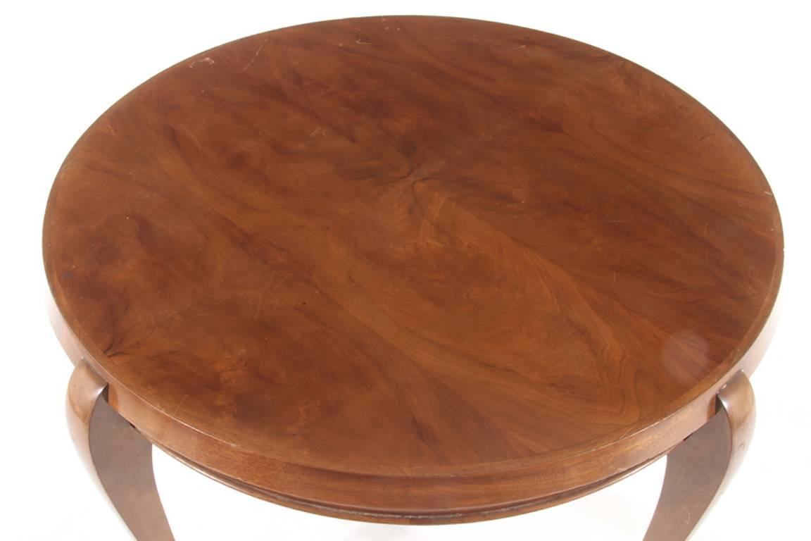 Beautifully proportioned coffee, side, breakfast table.  Mahogany with sculpted sabre legs.  


 