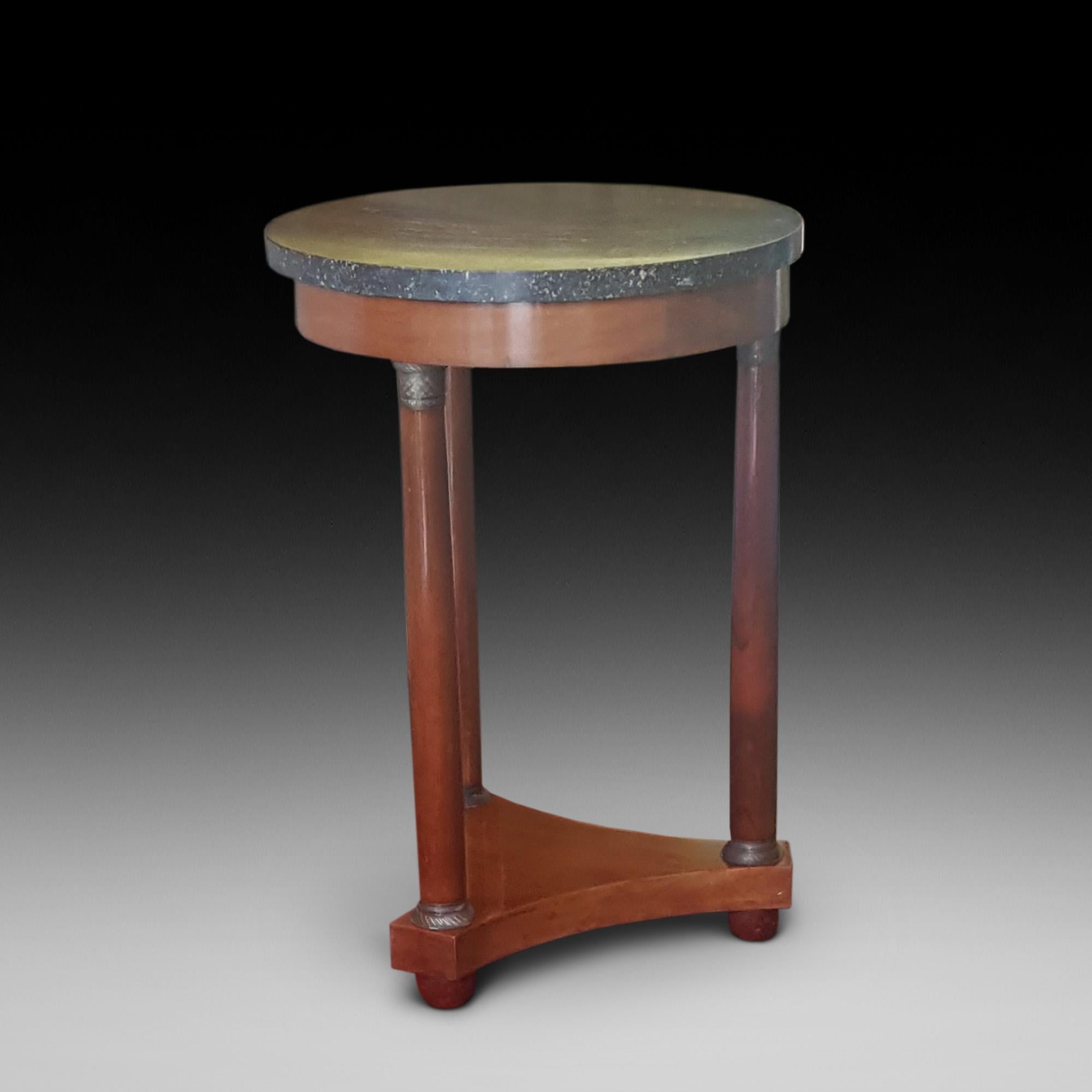 French mahogany Empire period lamp table with marble top on three brass capped pillars and triform, measures: Base 15.5