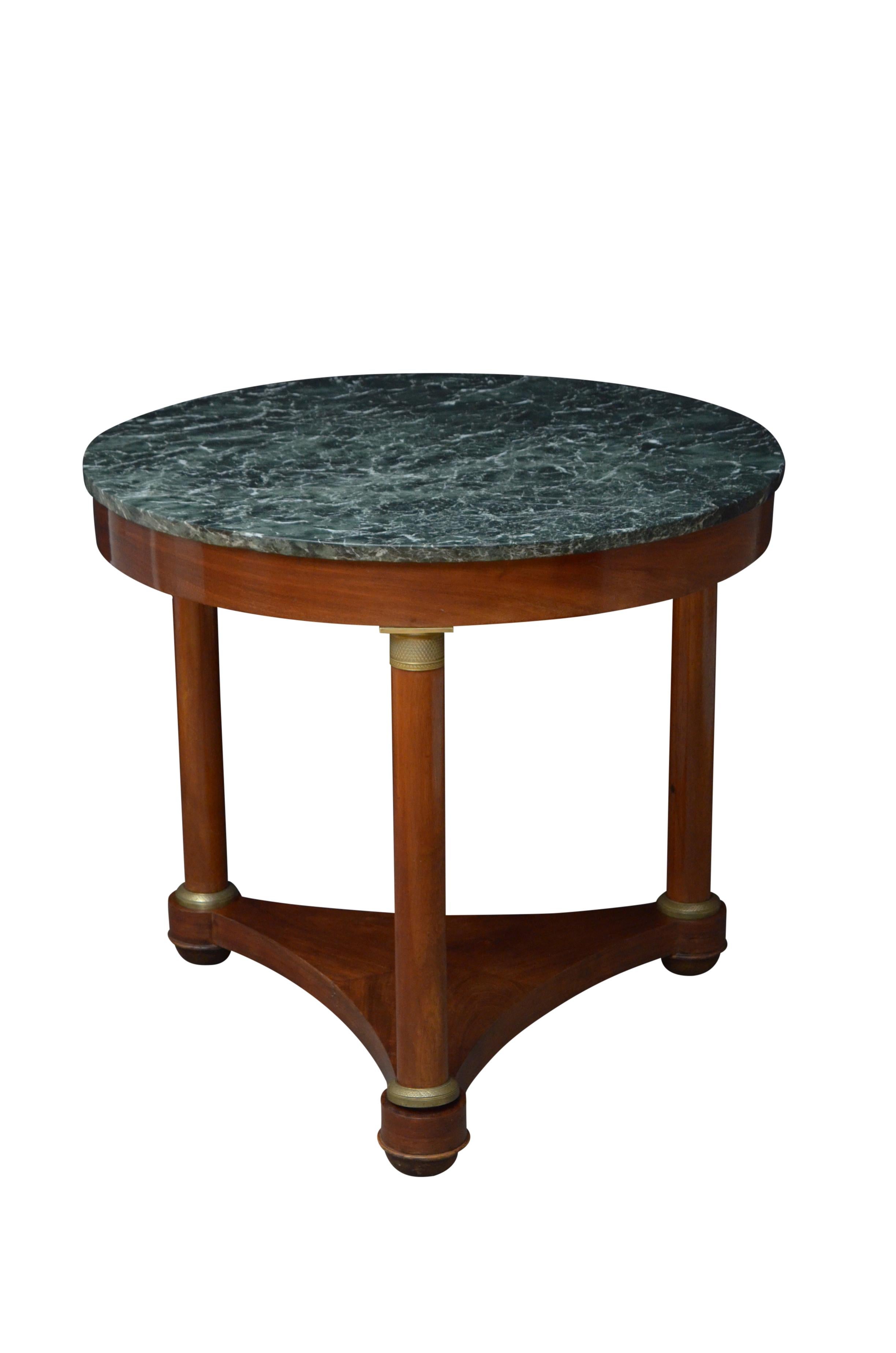 Elegant French mahogany centre table with stunning original green and veined marble top and 3 turned supports with brass decoration terminating in treform base and bun feet. This antique centre table is in excellent original condition throughout,