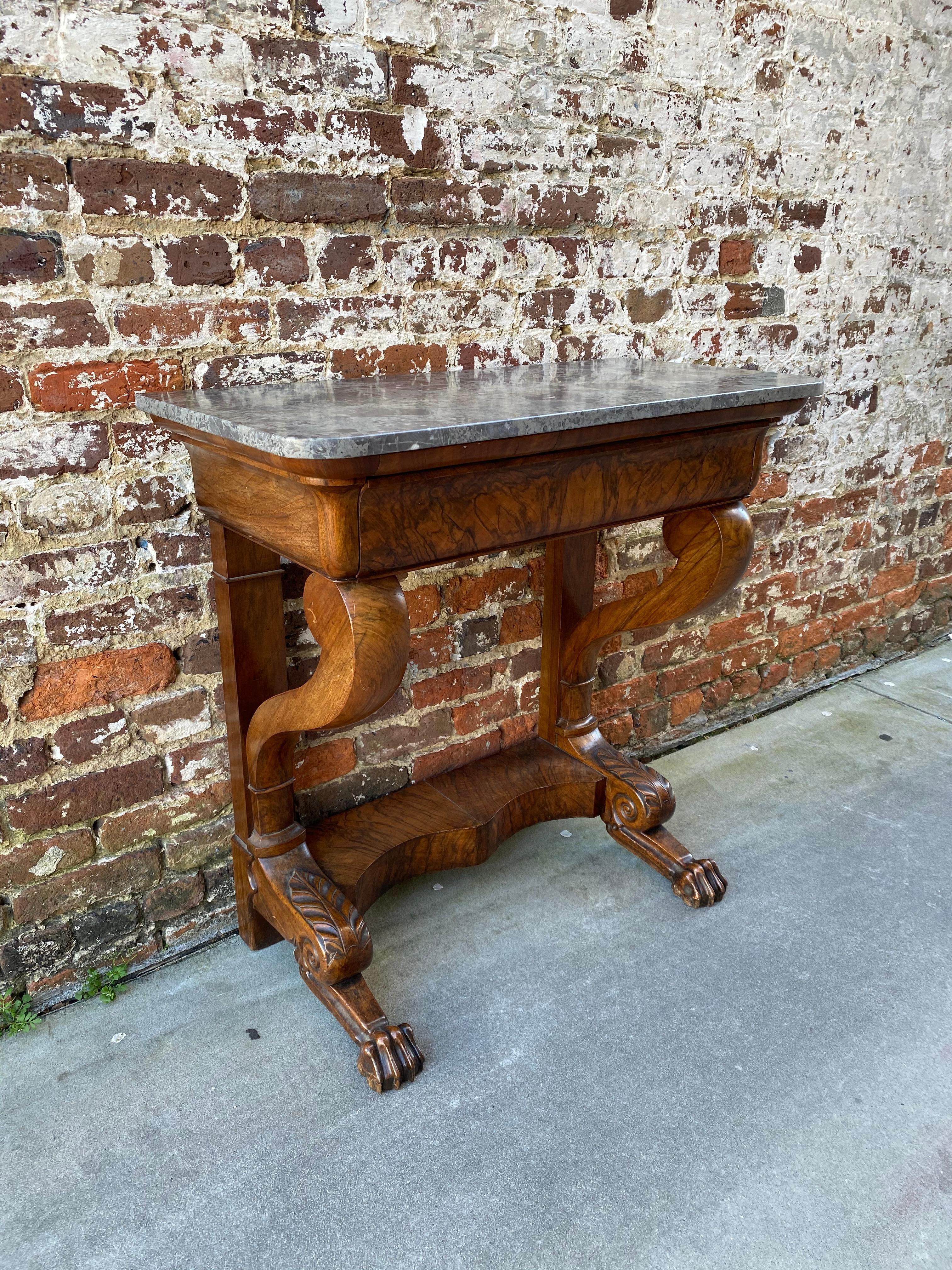 French mahogany marble top console table with paw feet mid 19th century.