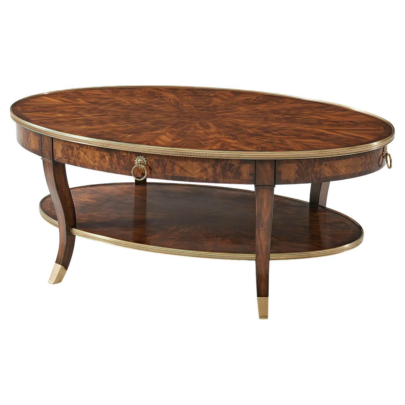 French Mahogany Oval Cocktail Table For Sale