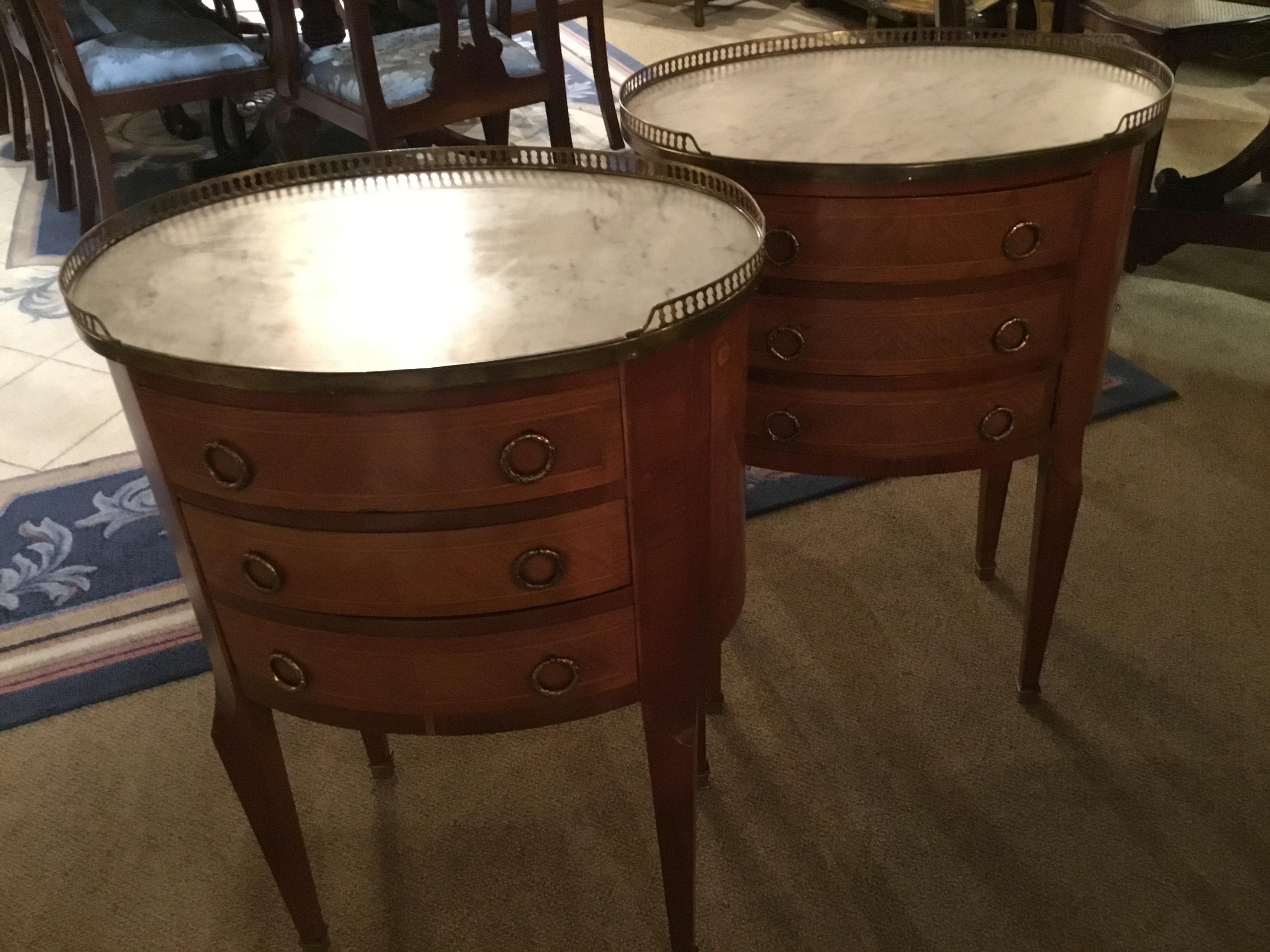 French Mahogany pair of occasional tables in oval form with marble tops 1