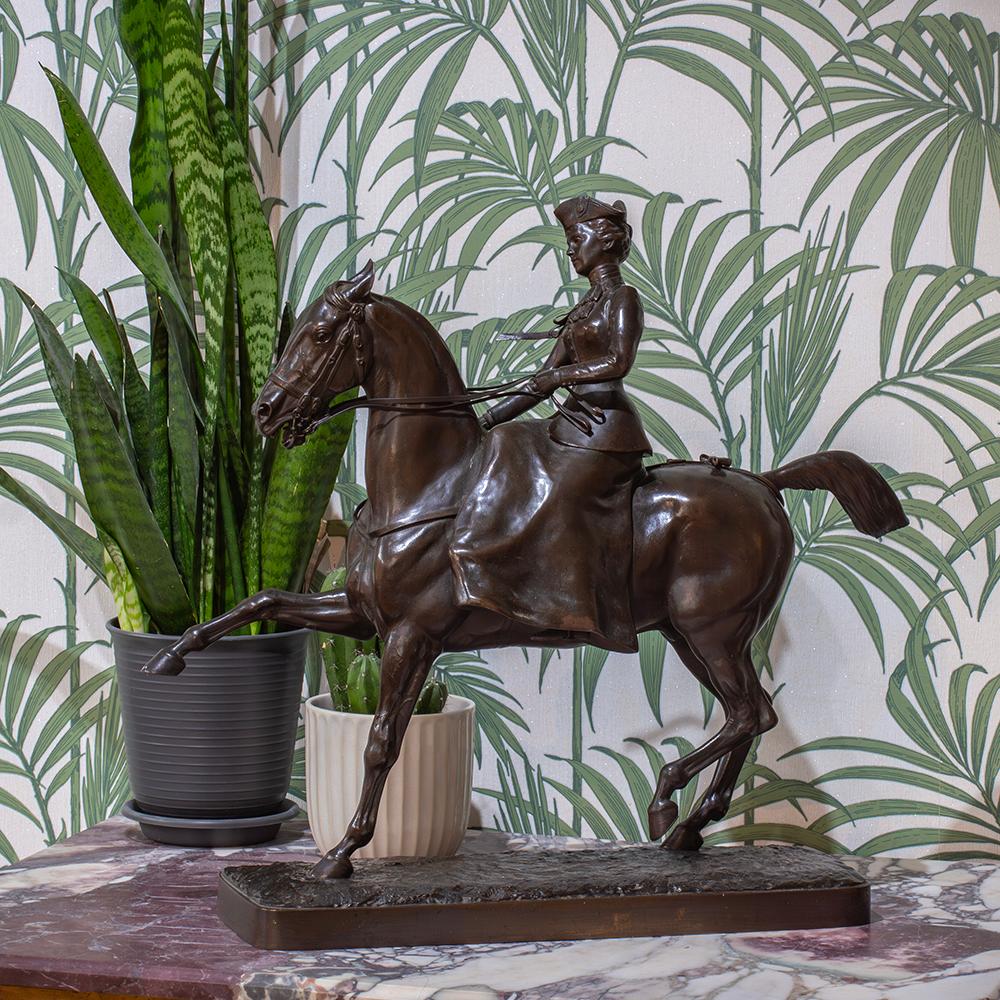 From our Sculpture collection, we are pleased to offer this beautifully cast French Bronze figure of a Maiden upon Horseback. The Bronze figure highly detailed showing a maiden classically dressed riding side saddle whilst holding the reins