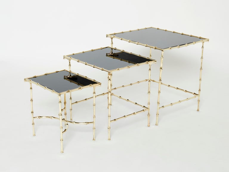 Mid-Century Modern French Maison Baguès Bamboo Brass Black Top Nesting Tables 1960s For Sale