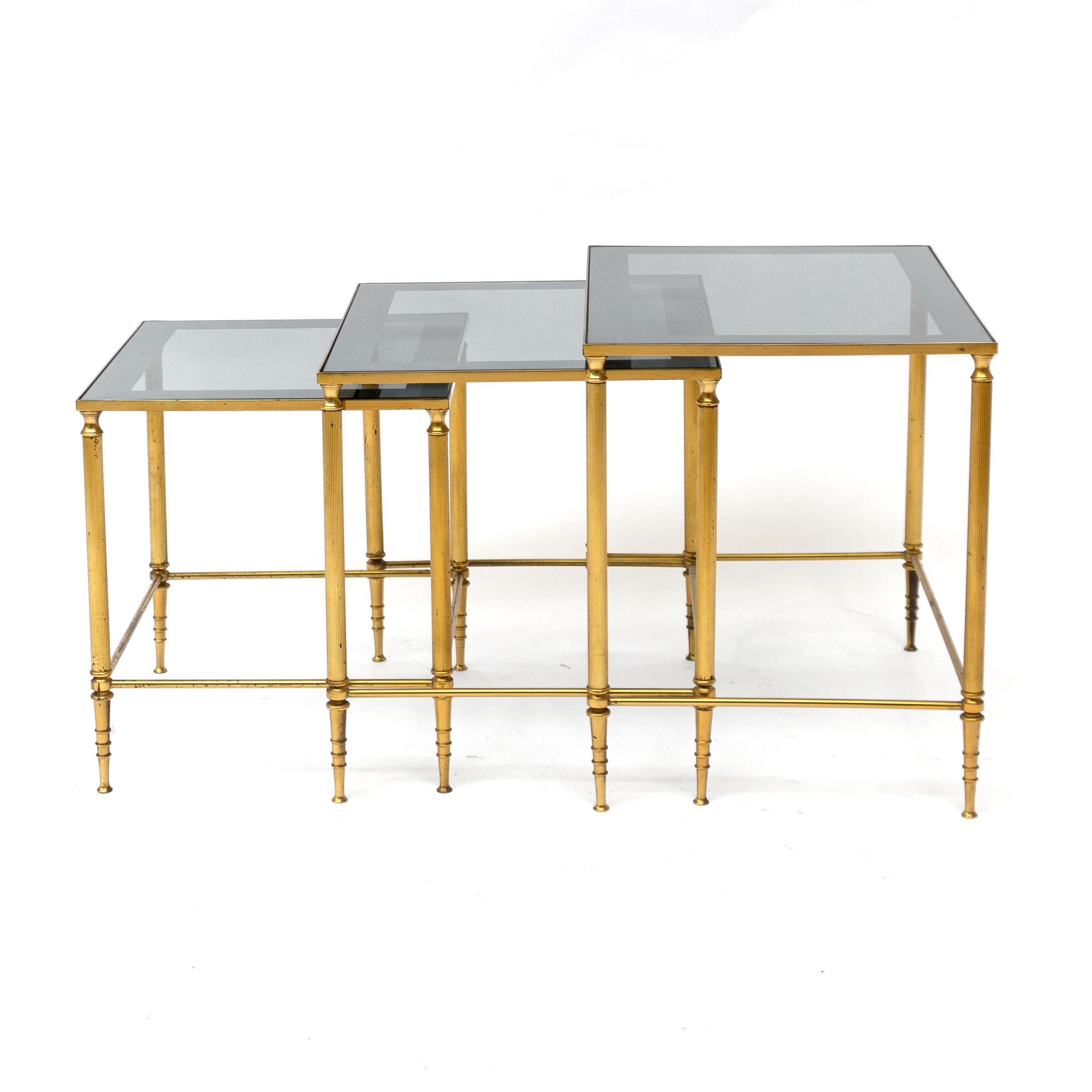 The mirrored glass tabletop makes these tables chique and elegant. Typical for the Mid-Century Modern Hollywood Regency style. Both the brass frames and the mirrored glass top show a very elegant patine!

no.1: 38x36x33
no.2: 40x42x35
no.3: