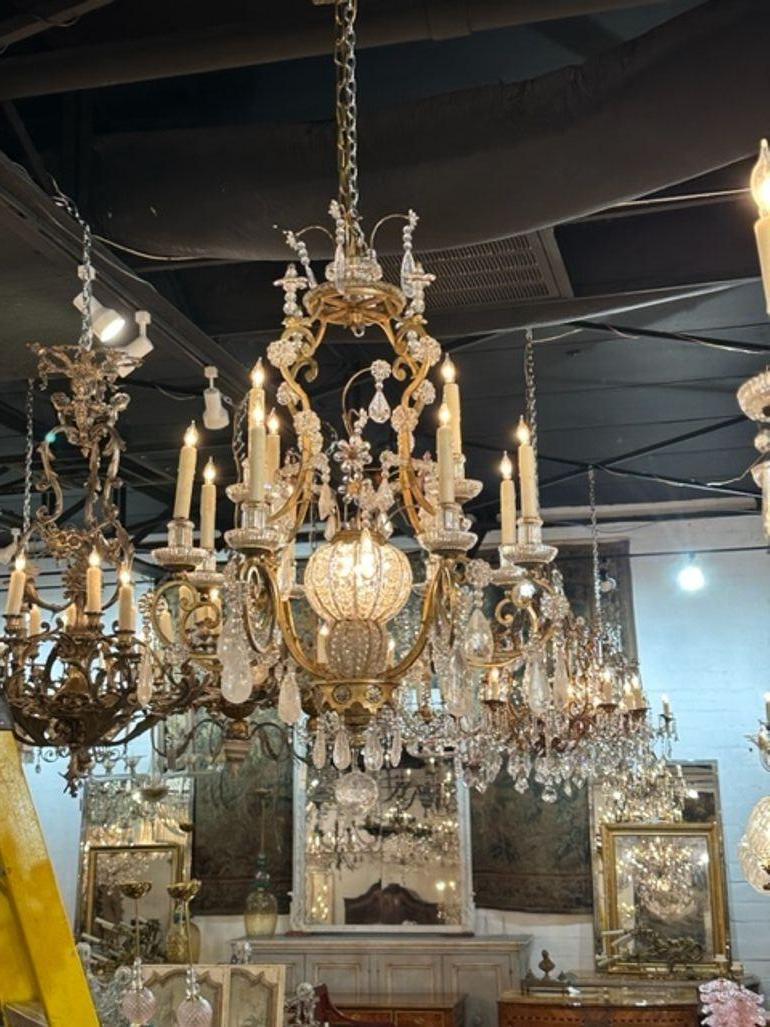 Gorgeous French Maison Bagues rock crystal chandelier. Circa 1910. The chandelier has been professionally rewired, comes with matching chain and canopy. It is ready to hang! A fine addition to any home!