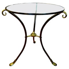 Table ou Guéridon en laiton de style Maison Baguès avec plateau en verre