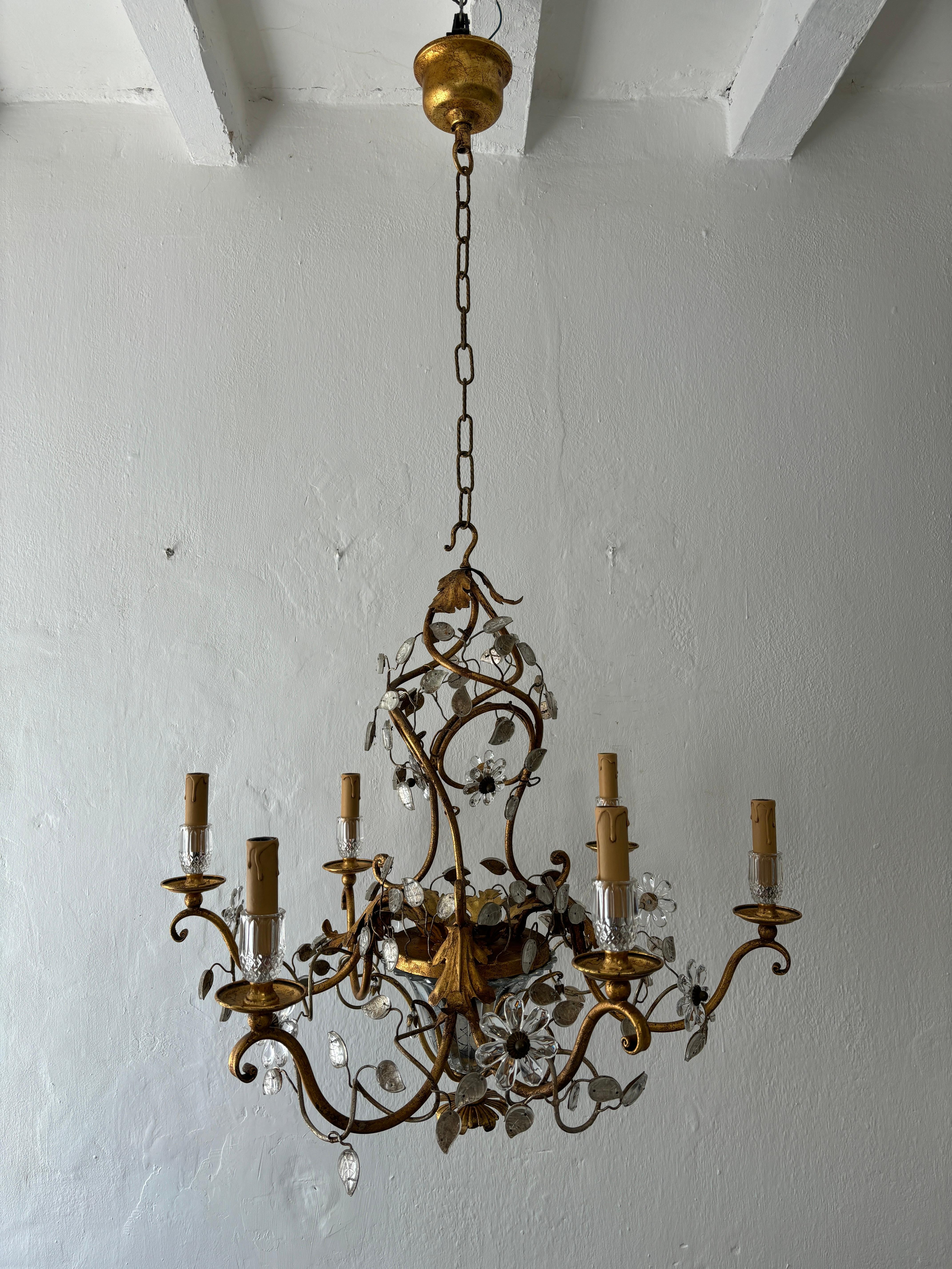 Housing  an impressive 6 lights.  This will be newly rewired with certified US UL sockets for the USA and appropriate sockets for all other countries.   Bulbs in cut crystal holders.  Gold scroll with glass covered leaves and crystal flowers. 