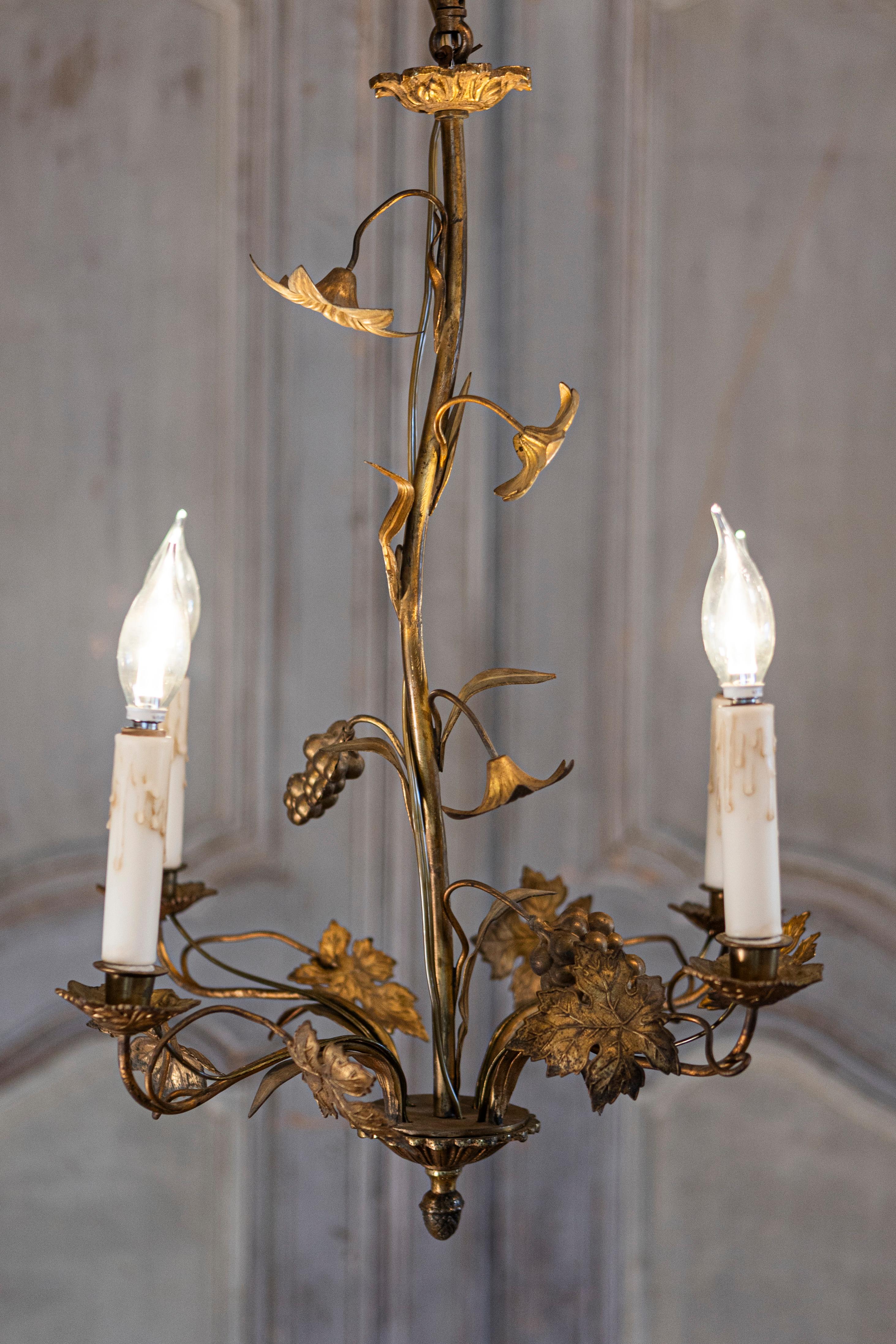 French Maison Charles Inspired Gilt Metal Four-Light Chandelier with Flowers In Good Condition For Sale In Atlanta, GA