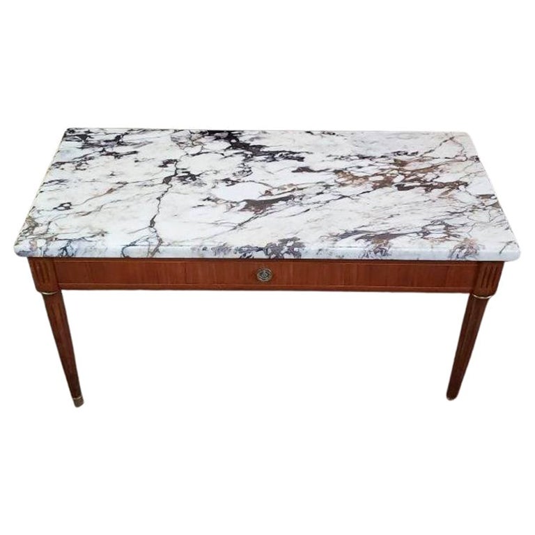 Mesa neoclásica de mármol calacatta atribuida a la Maison Jansen francesa Luis XVI en venta