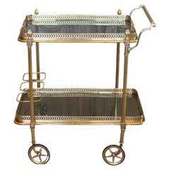 Carrello da bar francese Maison Jansen stile impero anni '40 in ottone con ripiani in vetro colorato