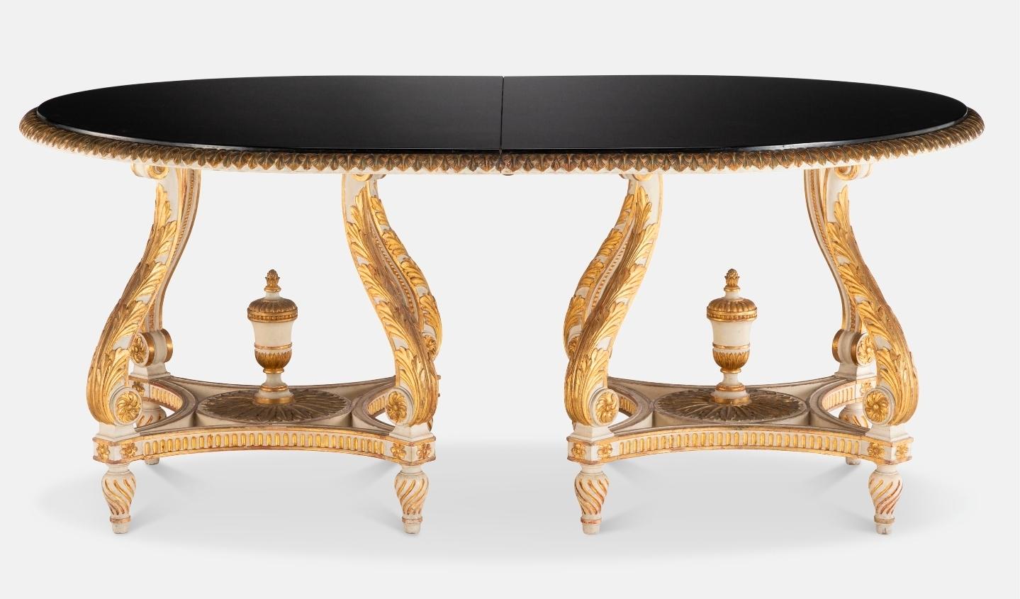 A rare, magnificent, and well documented French double pedestal dining table by iconic luxury Parisian design house Maison Jansen. 

Paris, France, circa 1940

This dining table was created by Jansen who sold an identical dining table to the Duke