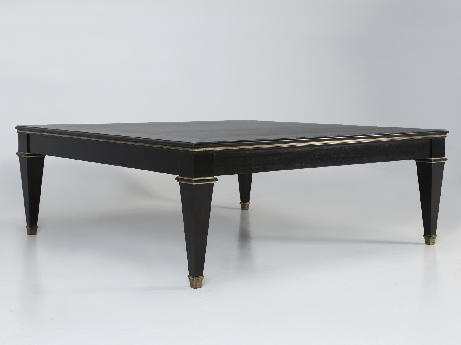 French Maison Jansen or Directoire style coffee table that in our home, might more accurately be described as a cocktail table. This particular Maison Jansen or Directoire style coffee table, is just another creative product from our Old Plank
