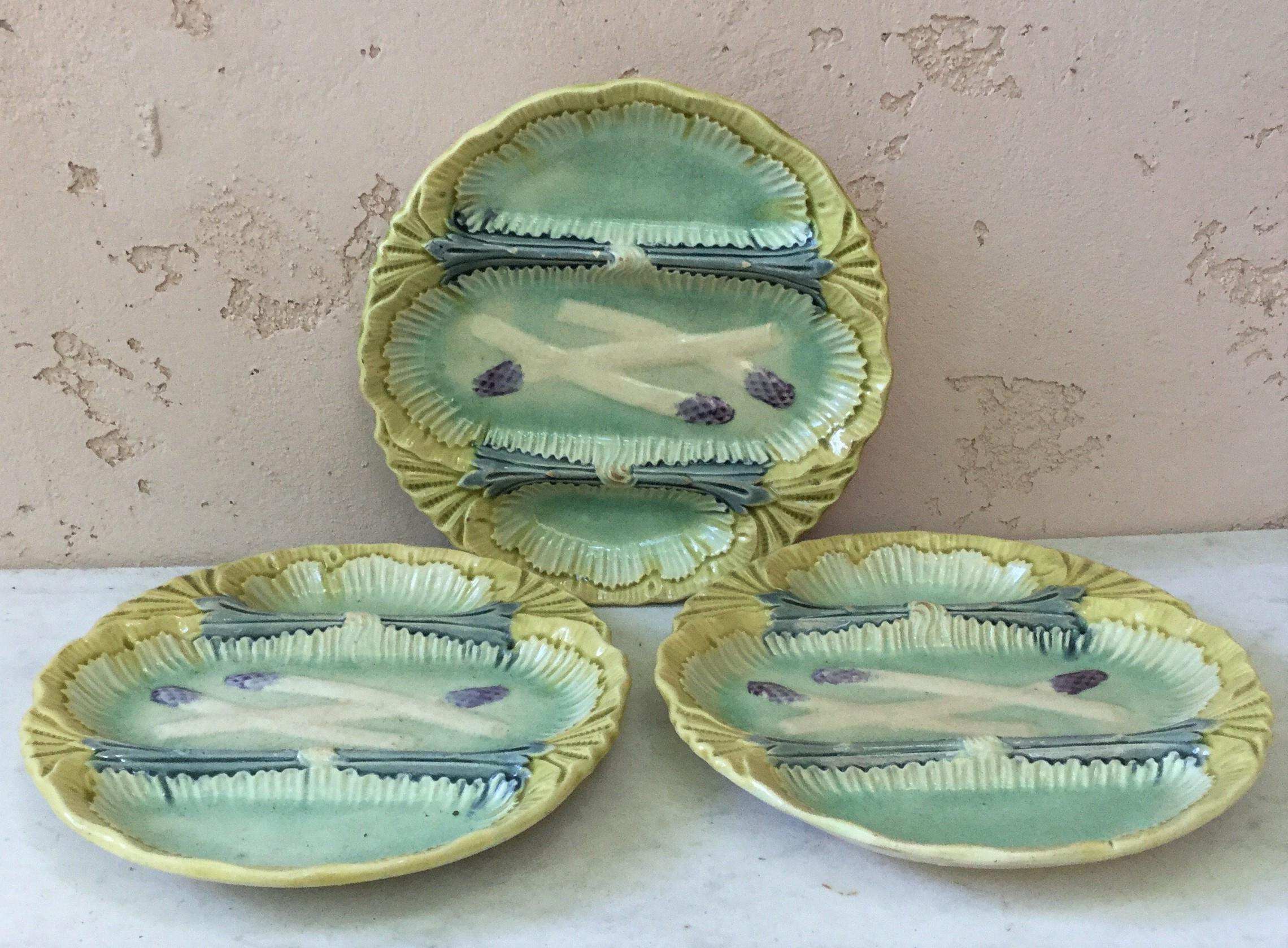 Unusual French Majolica asparagus plate with 3 spaces unsigned, circa 1890.