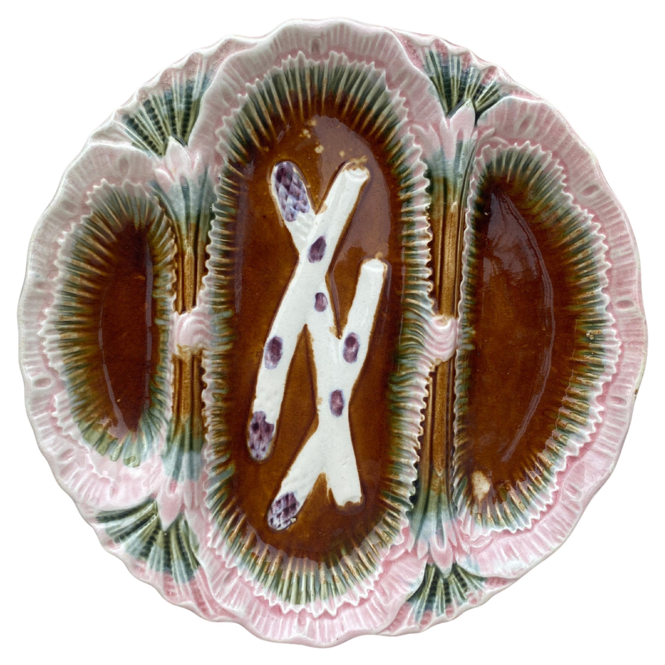 Unusual French Majolica asparagus plate with 3 spaces unsigned, circa 1890.