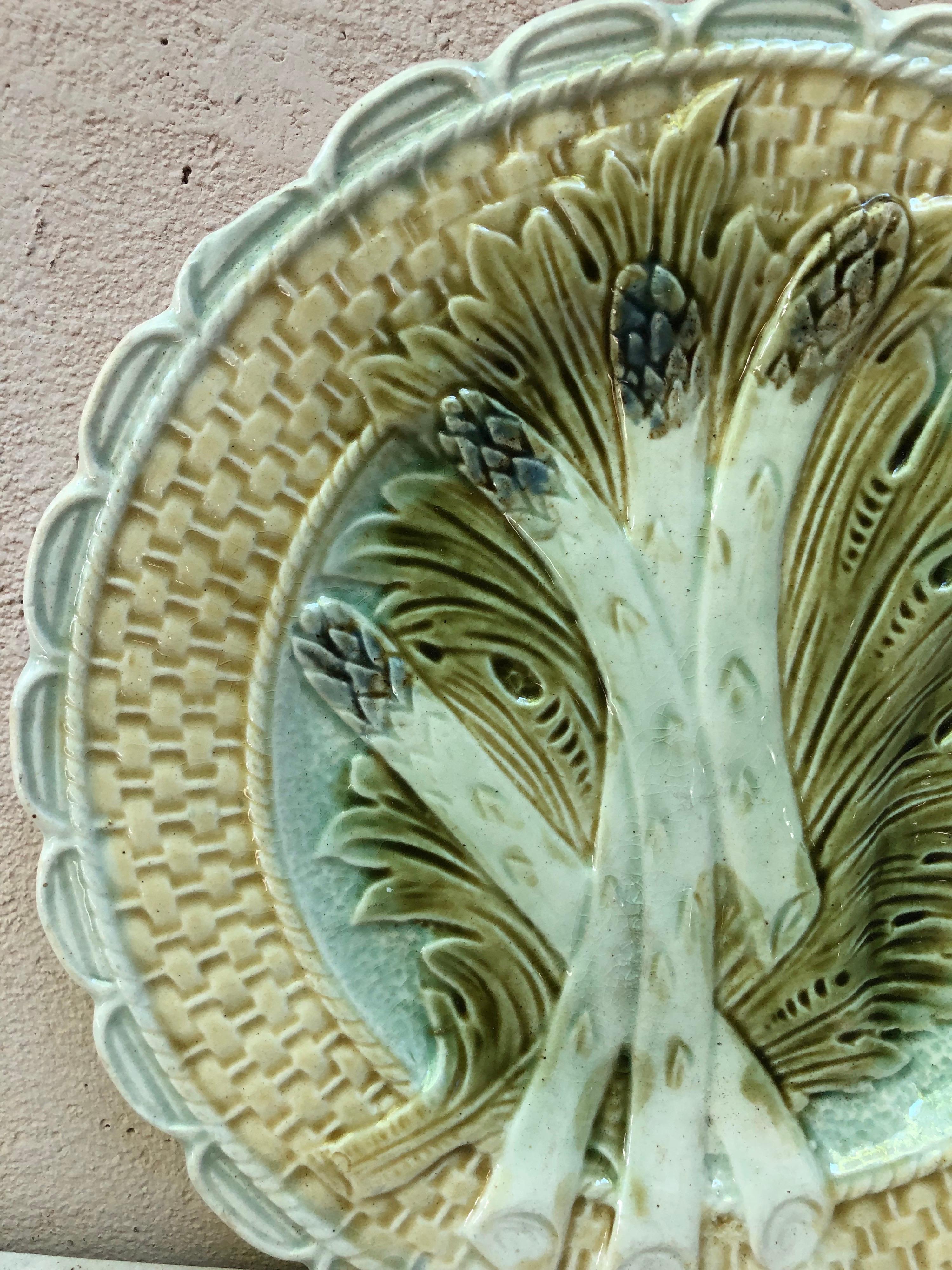 Colorful Majolica asparagus and artichoke plate Salins, circa 1890.
  