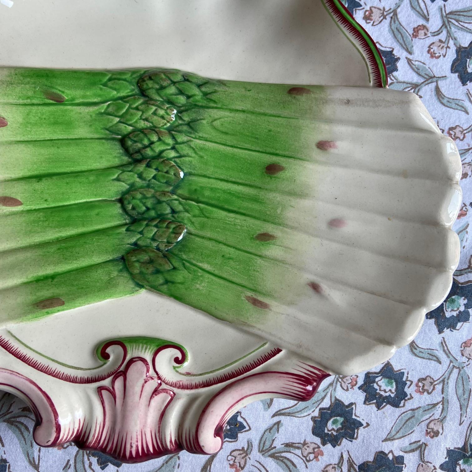 These very rare Sarreguemines plates will be incredible on any table.
They are referenced in “Artichauts et Asperges en Barbotine” by Maryse Bottero.
Please note one plate has a more light green colour than the others (top right on first picture).