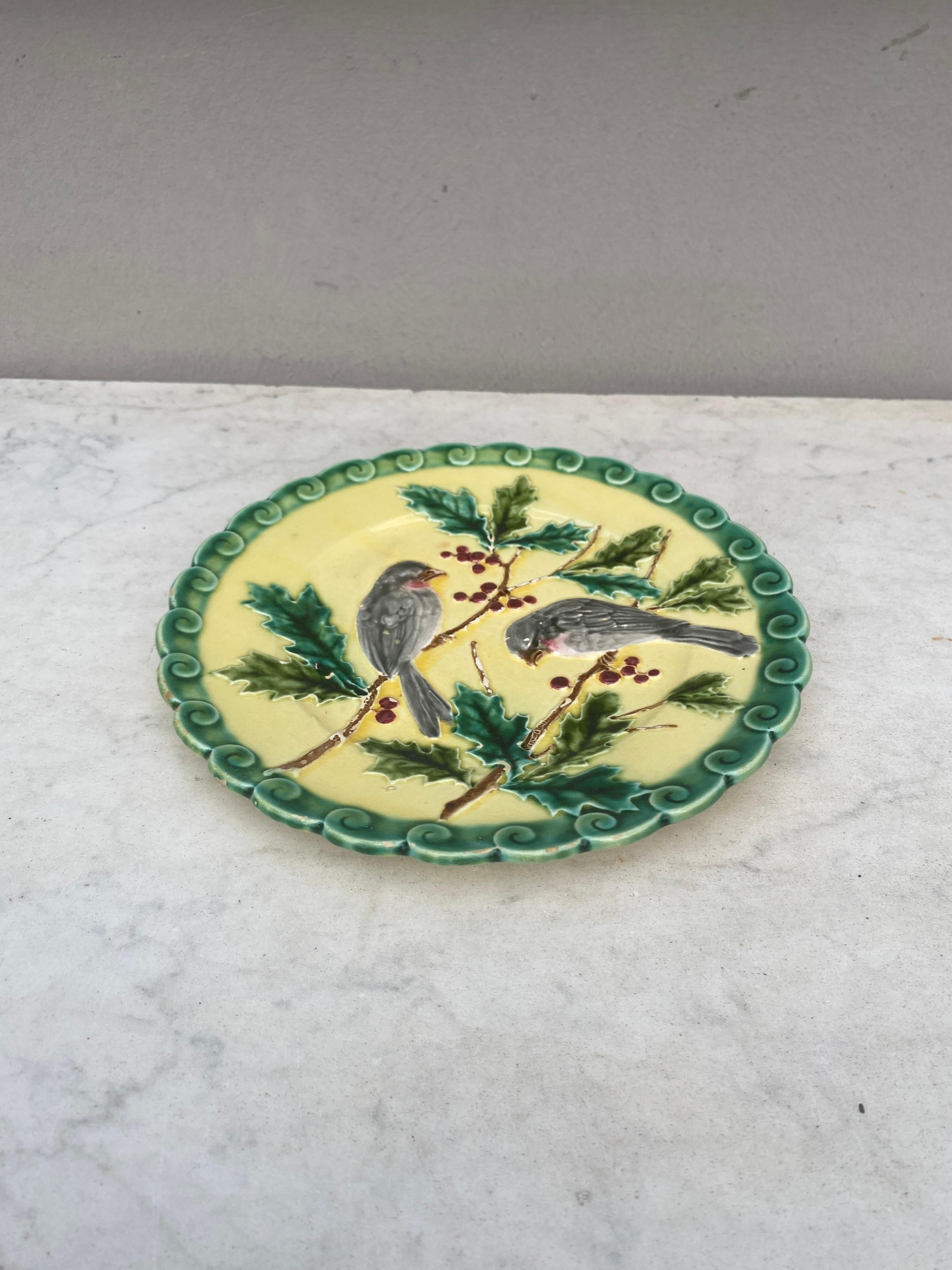 French Majolica bird with holly plate signed Sarreguemines, circa 1880.