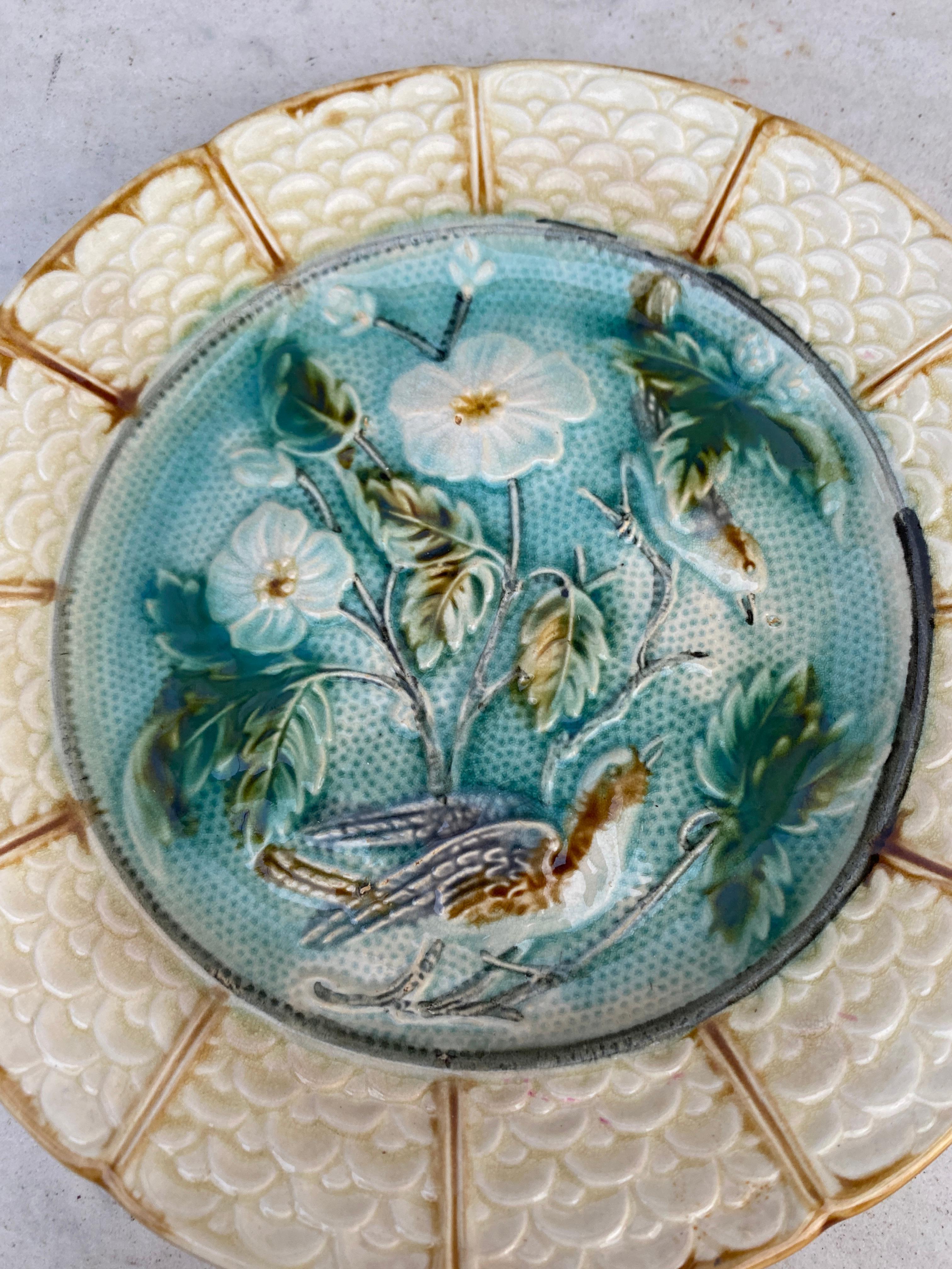 French majolica plate with bird and white flowers Onnaing, circa 1890.