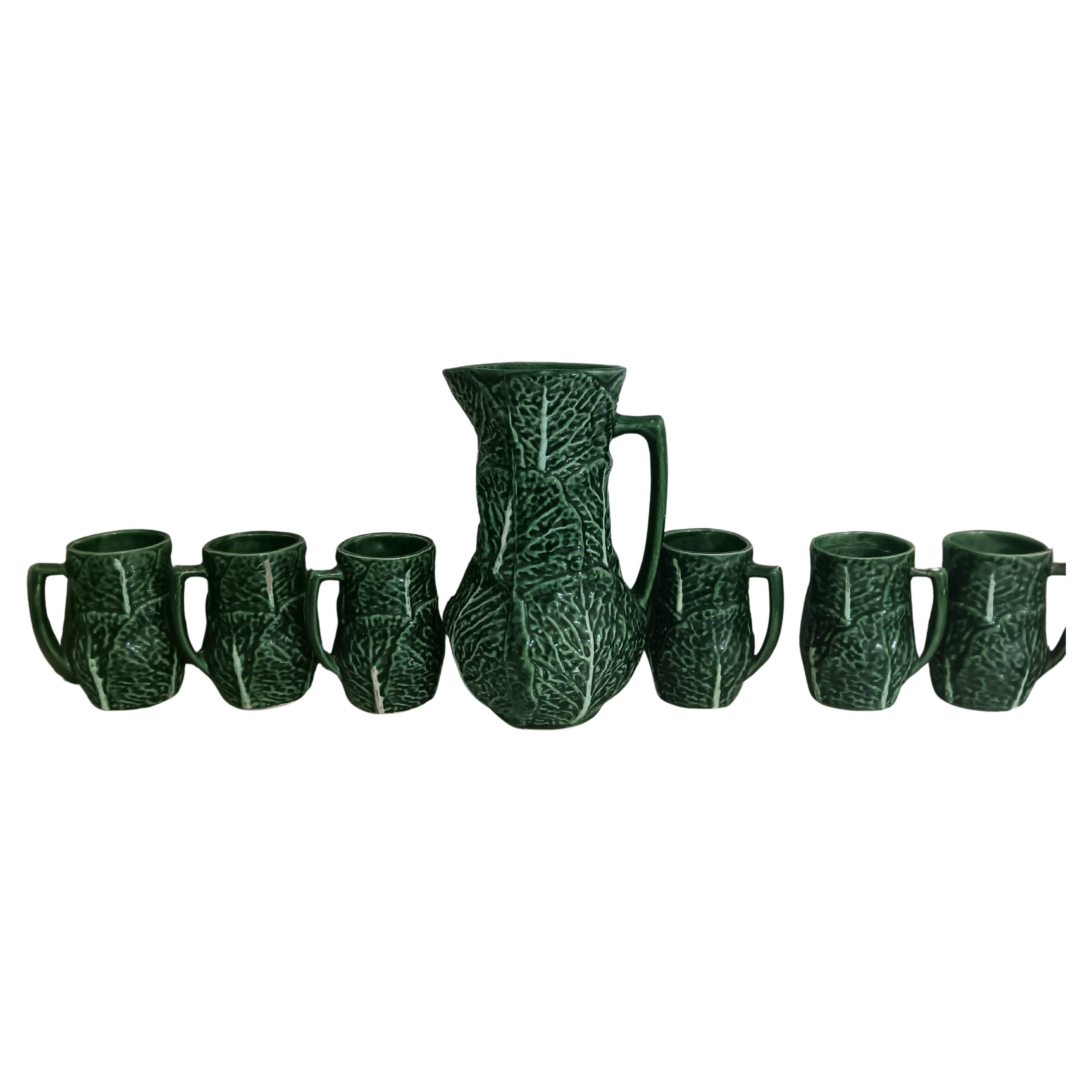 Ensemble de pichets et de verres en céramique de Majolique en forme de chou.
des gobelets de jus ou d'eau.
Comme neuf, jamais utilisé.
Comme neuf
Frech Provincial