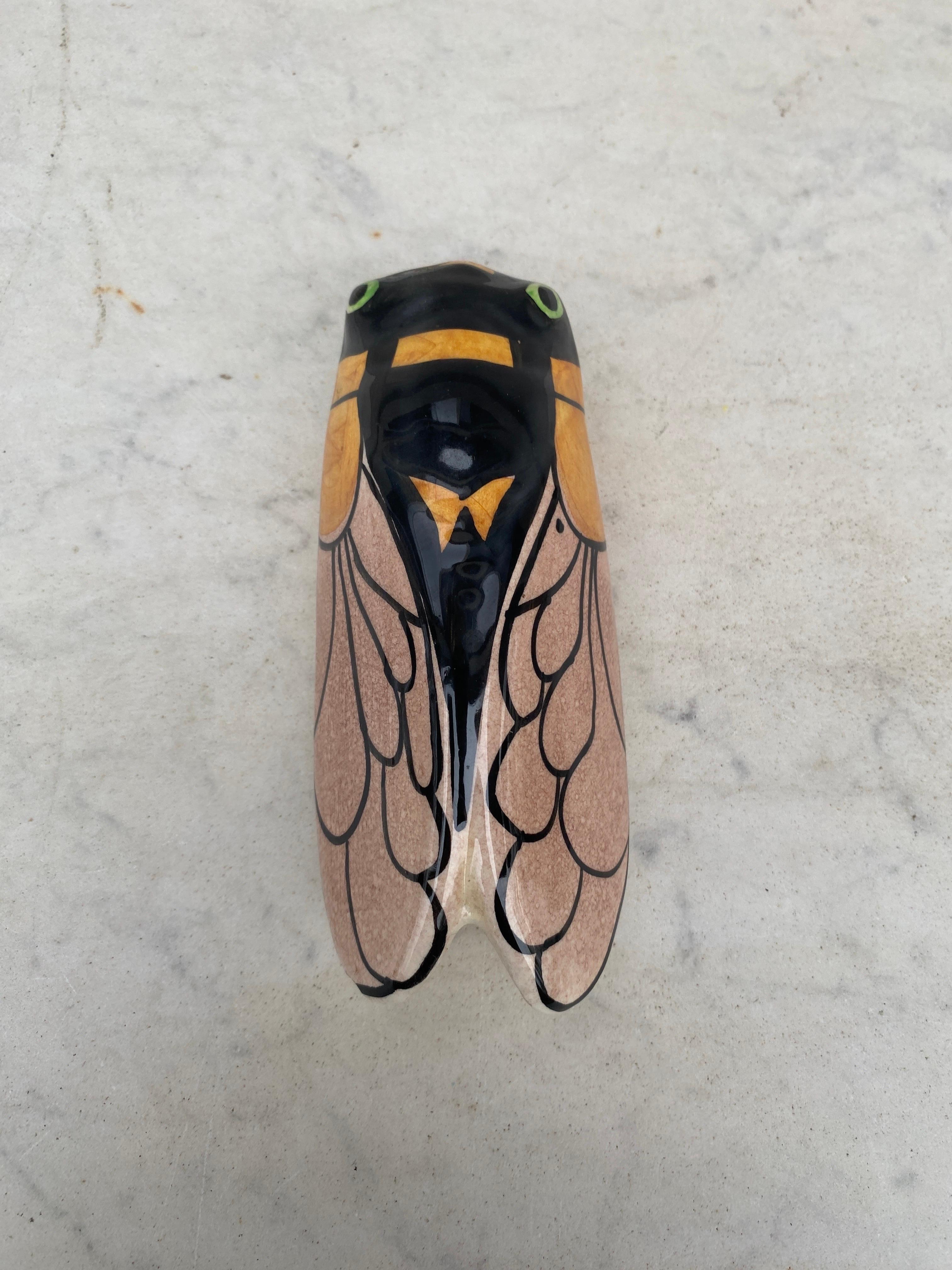 French Majolica cicada wall pocket  signed Vallauris from Provence.
Height / 5.3 inches.
