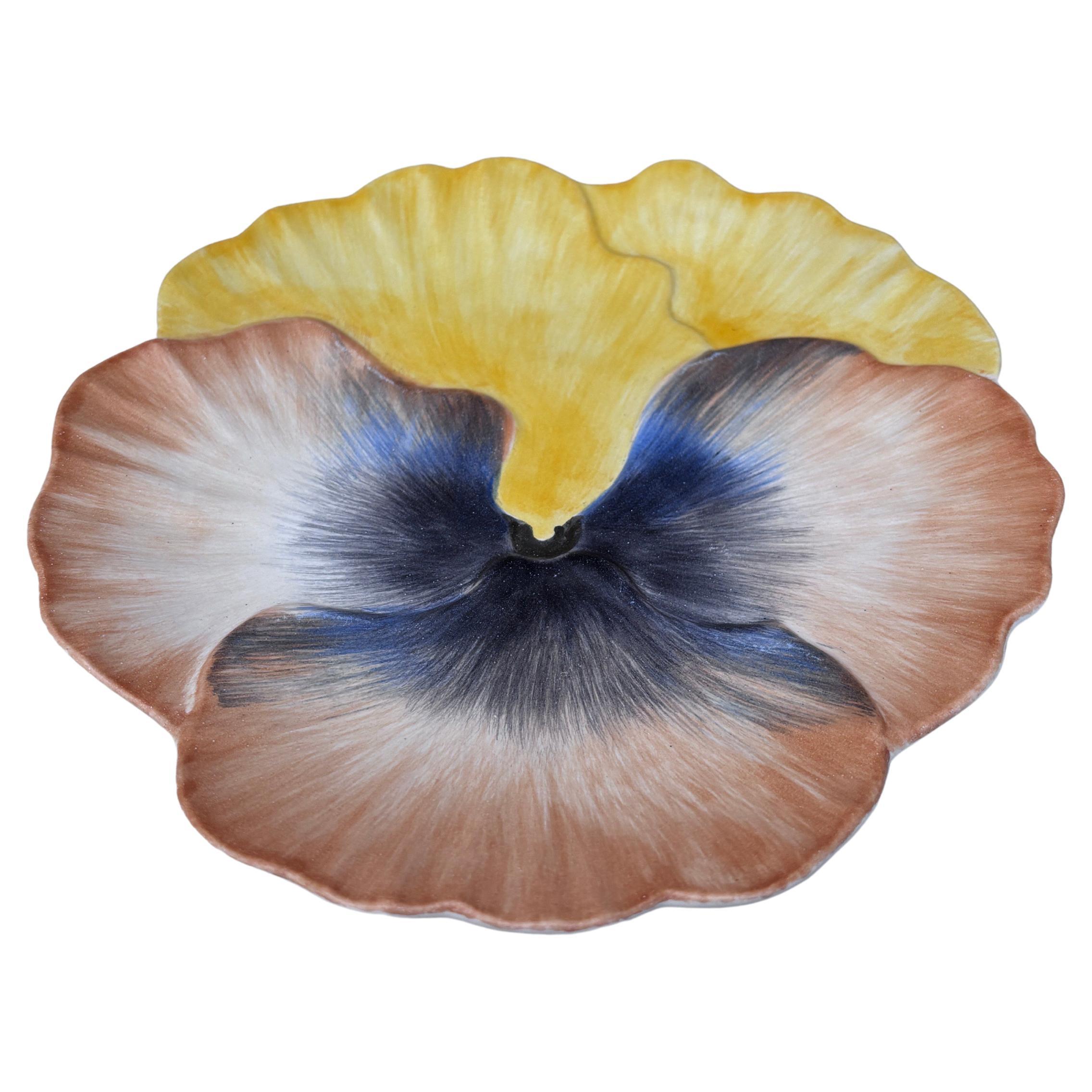 French Majolica Pansy Marcel Guillot Vallauris, circa 1950.
8.3 inches diameter.