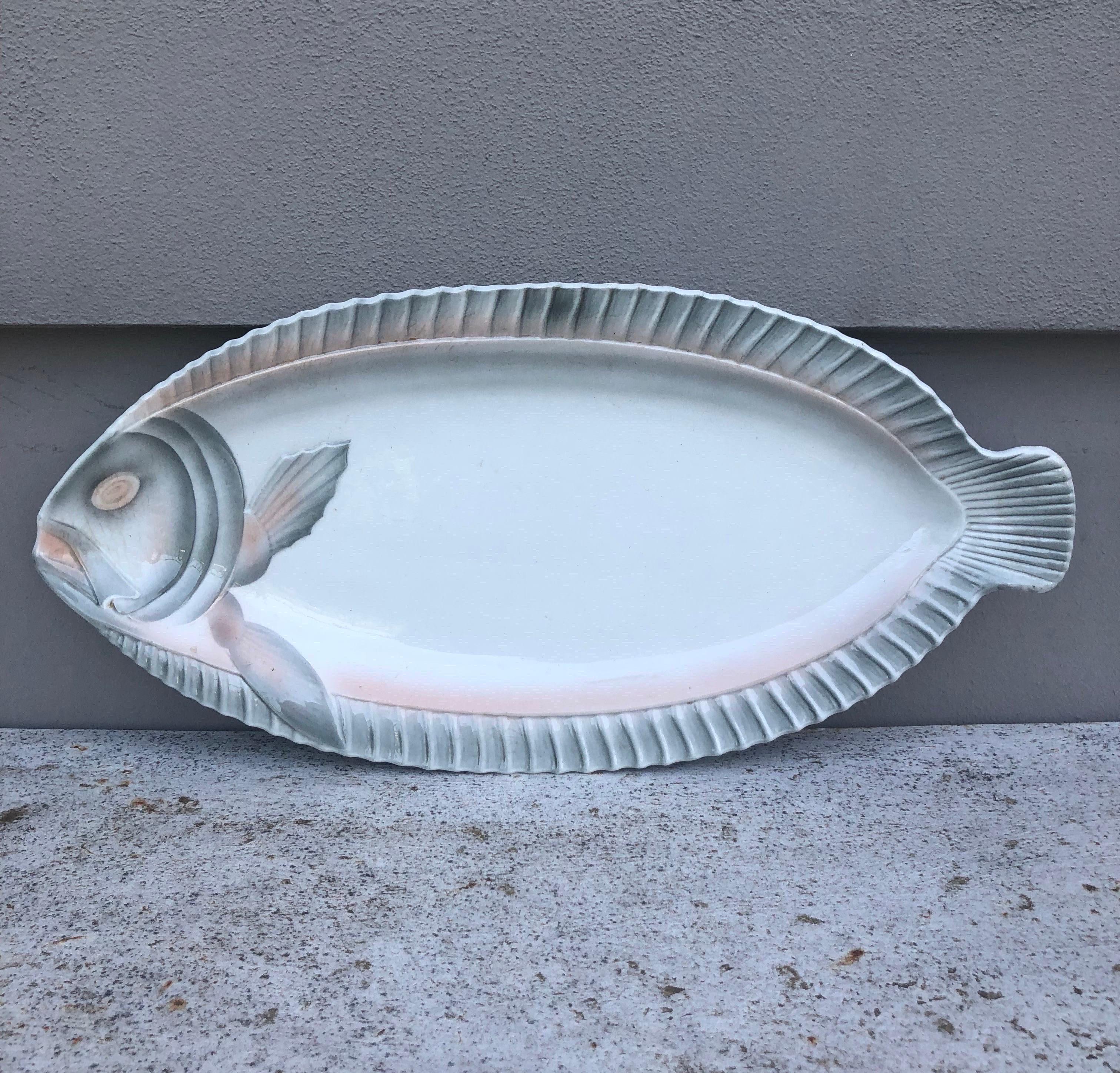 Large French Majolica fish platter signed Sarreguemines Circa 1930.
Measures: 21 inches Lenght.