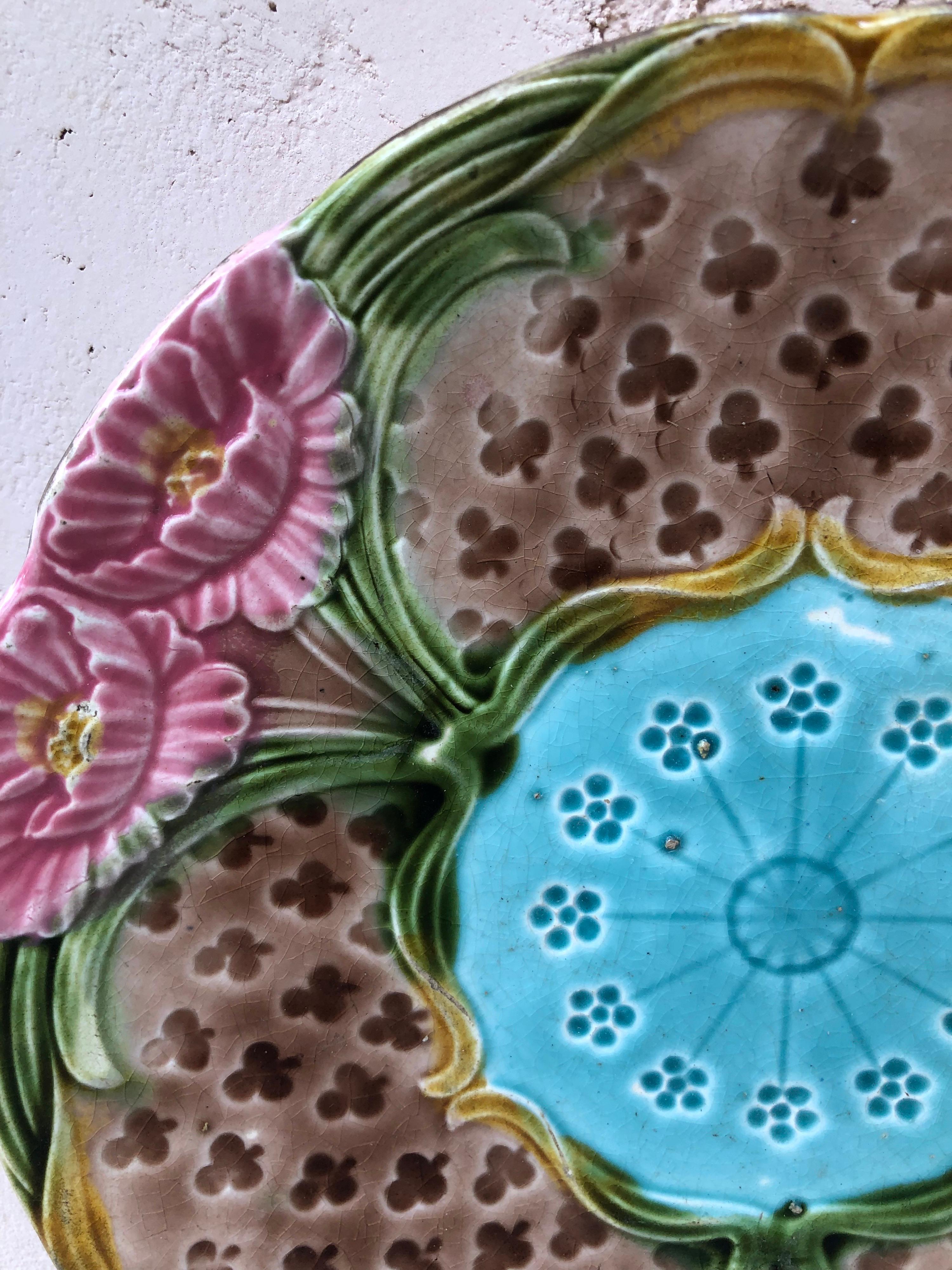 Colorful French Majolica flower plate signed Orchies, circa 1900.
 