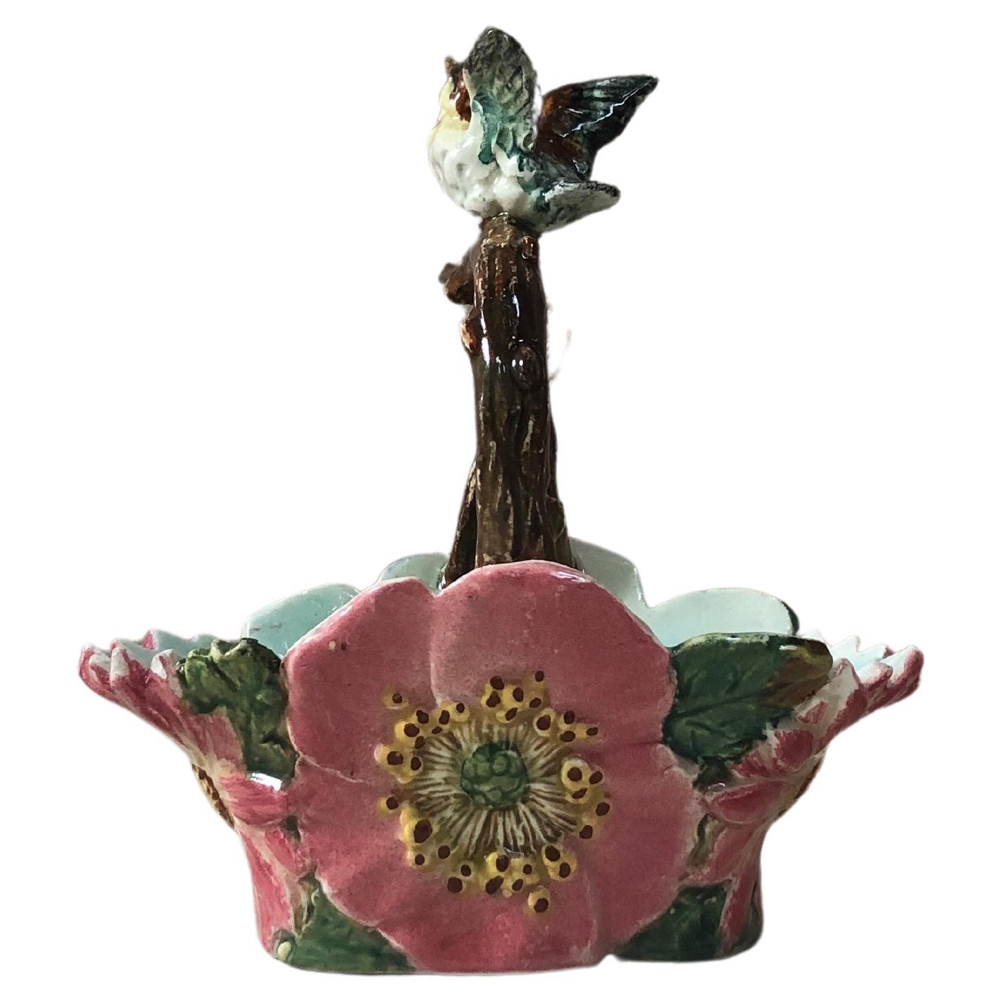 French Majolica flowers (pansies and daisies) basket with bird signed Delphin Massier, circa 1890.