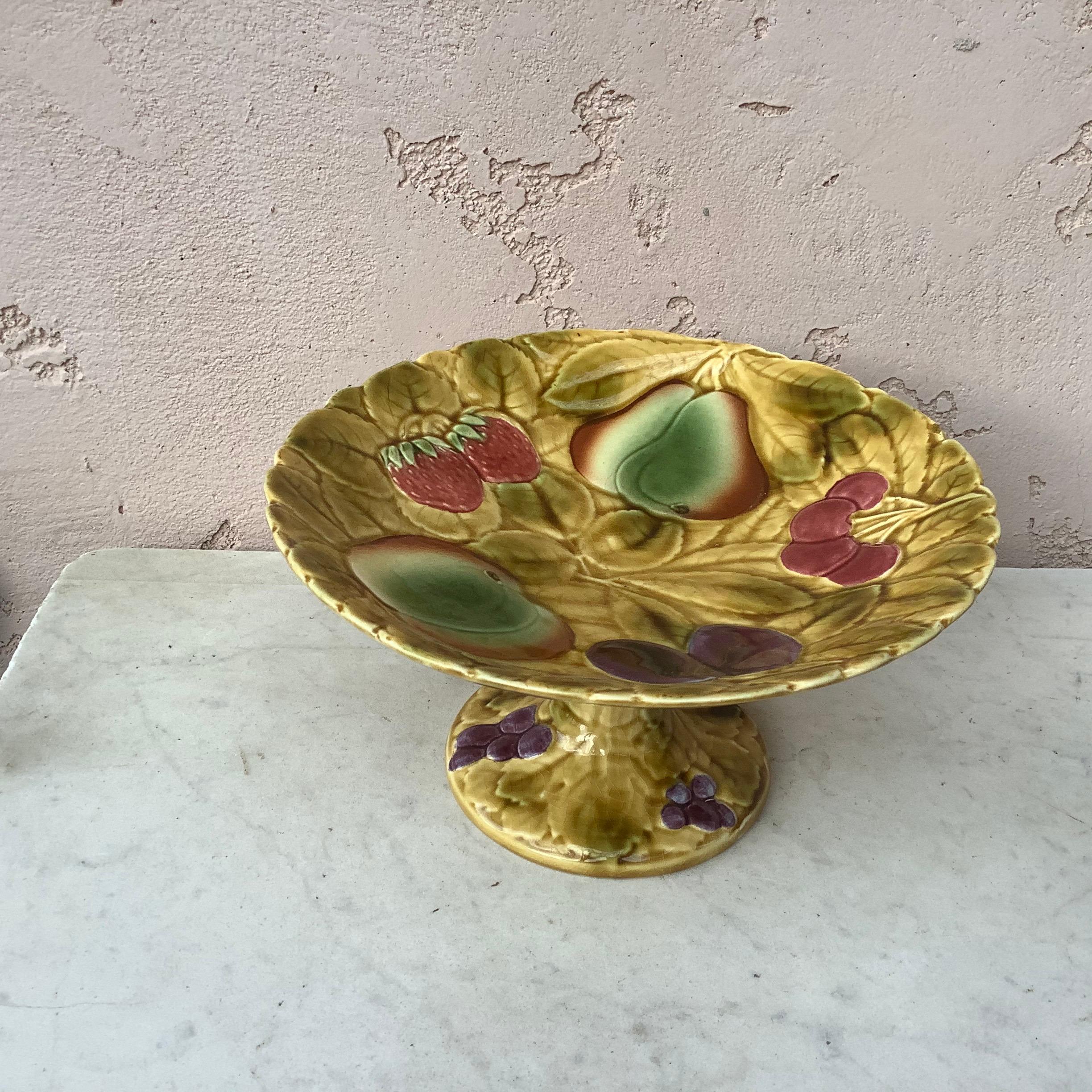 French Majolica fruits cake stand or comport signed Sarreguemines, circa 1920.