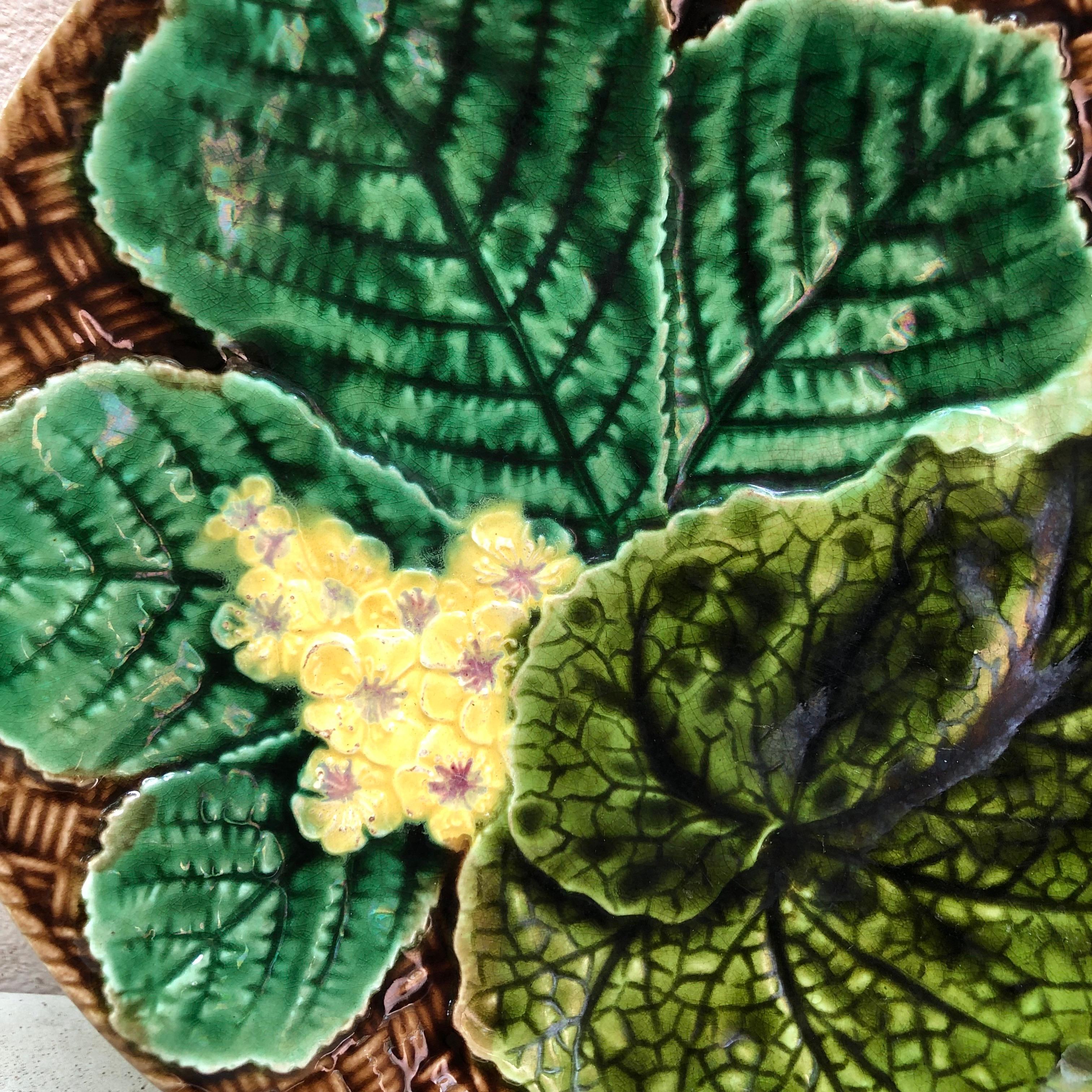 French Majolica leaves and yellow flowers plate Clairefontaine, circa 1890.