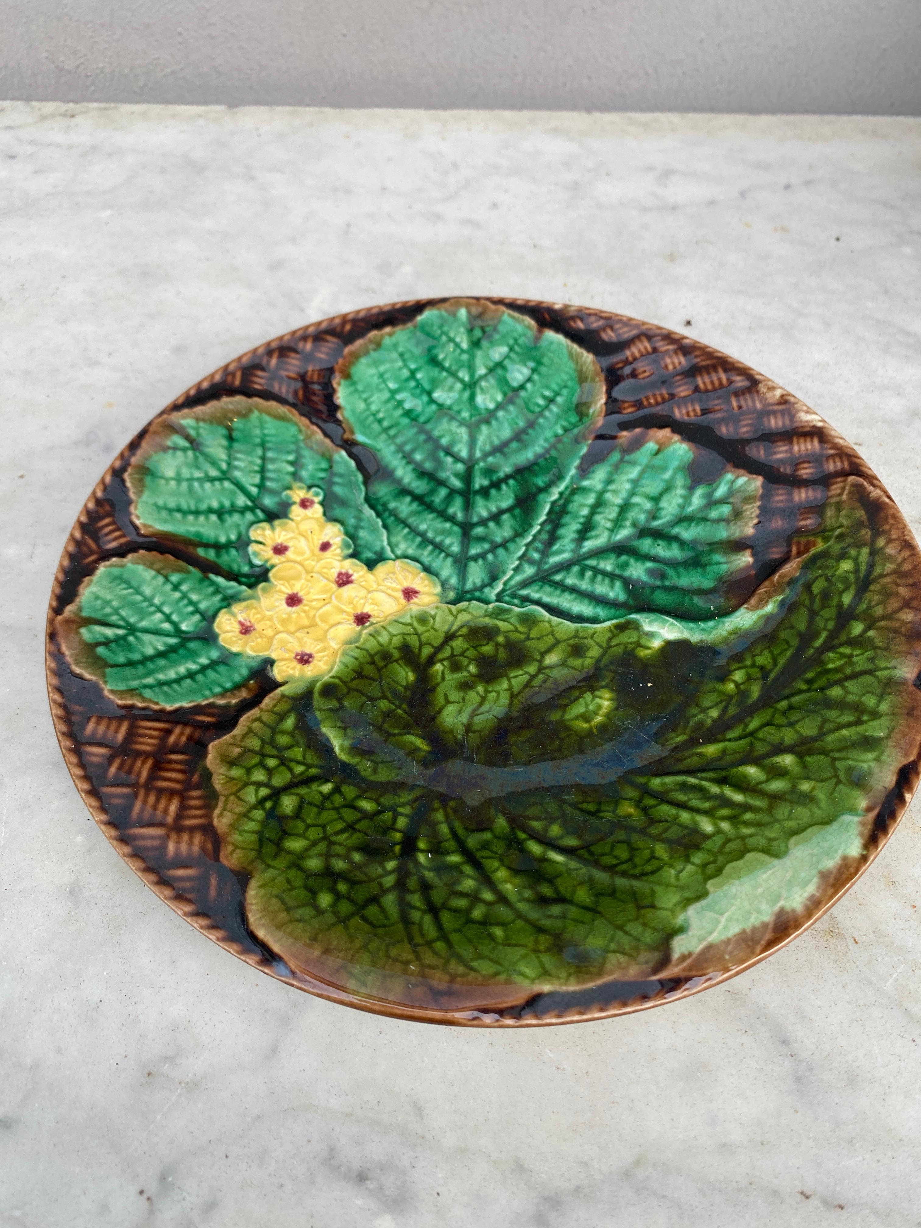 French Majolica leaves and yellow flowers plate Clairefontaine, circa 1890..