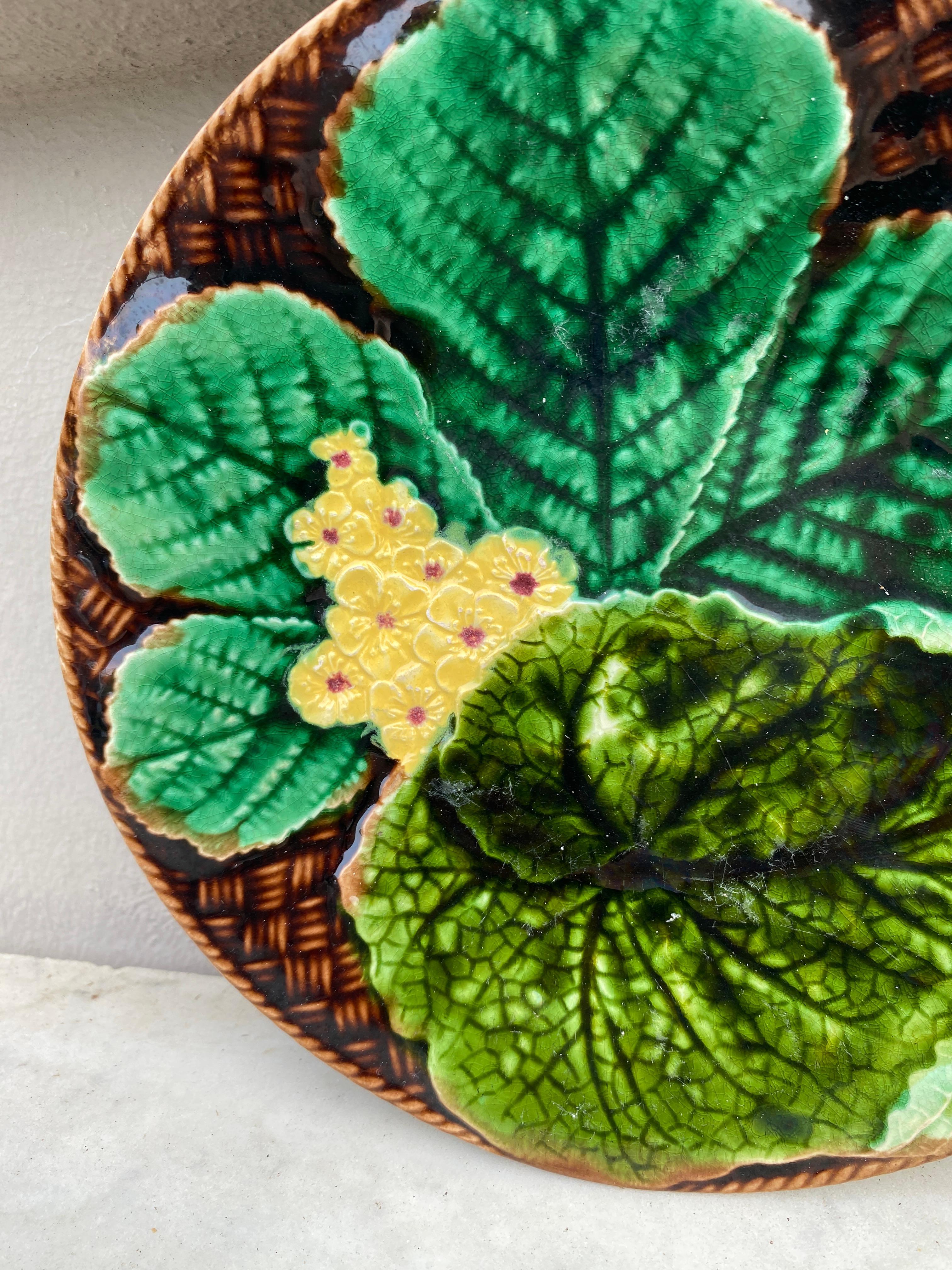 French Majolica leaves and yellow flowers plate Clairefontaine, circa 1890.