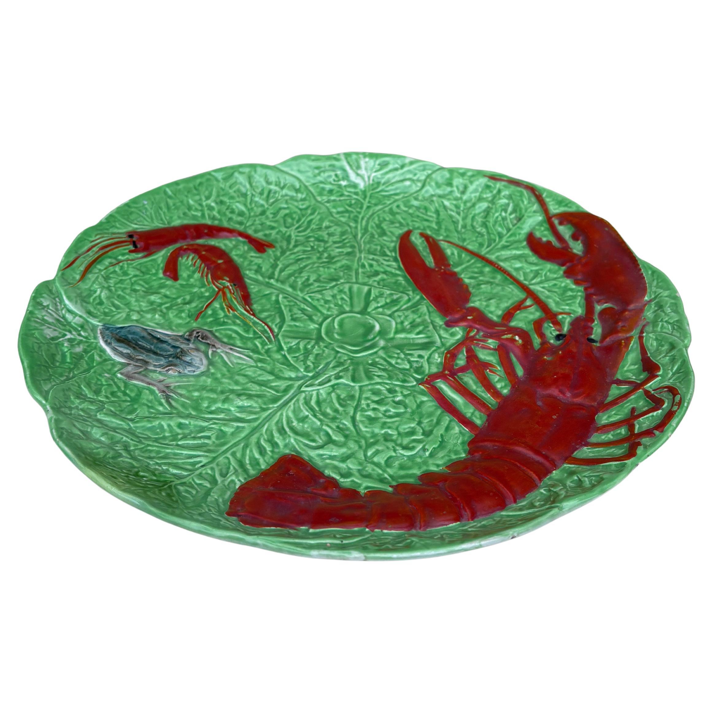 French Majolica Lobster ,Shrimp and frog Platter HB Choisy Le Roi Circa 1930.
The manufacture of Choisy le Roi was one of the most important manufacture at the end of 19th century, they produced very high quality ceramics of all kinds as Majolica.