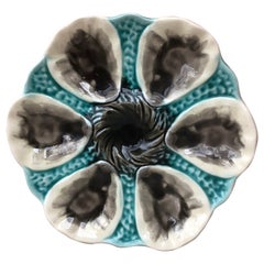 Assiette à huîtres en majolique française Orchies, vers 1910