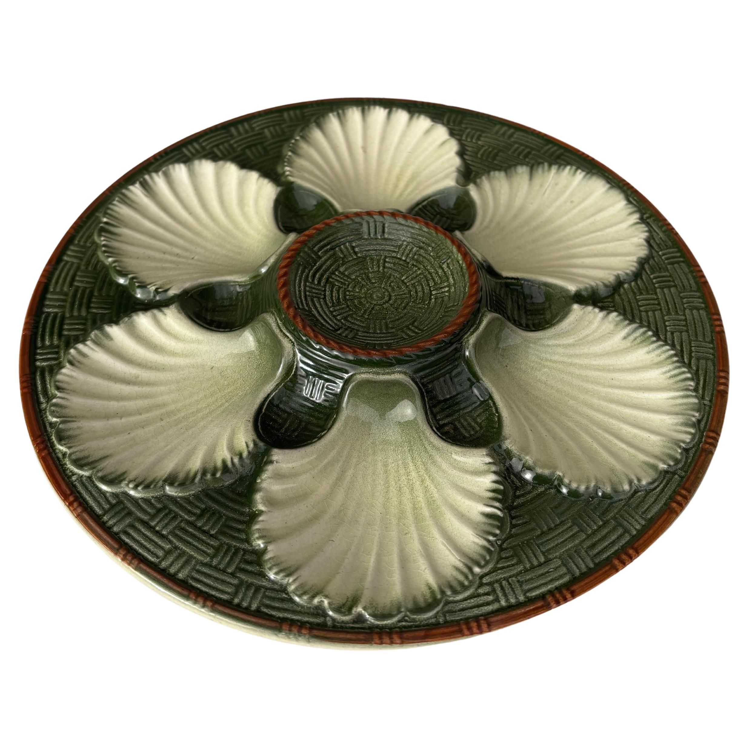 French Majolica oyster plate signed Saint Clement, circa 1920.