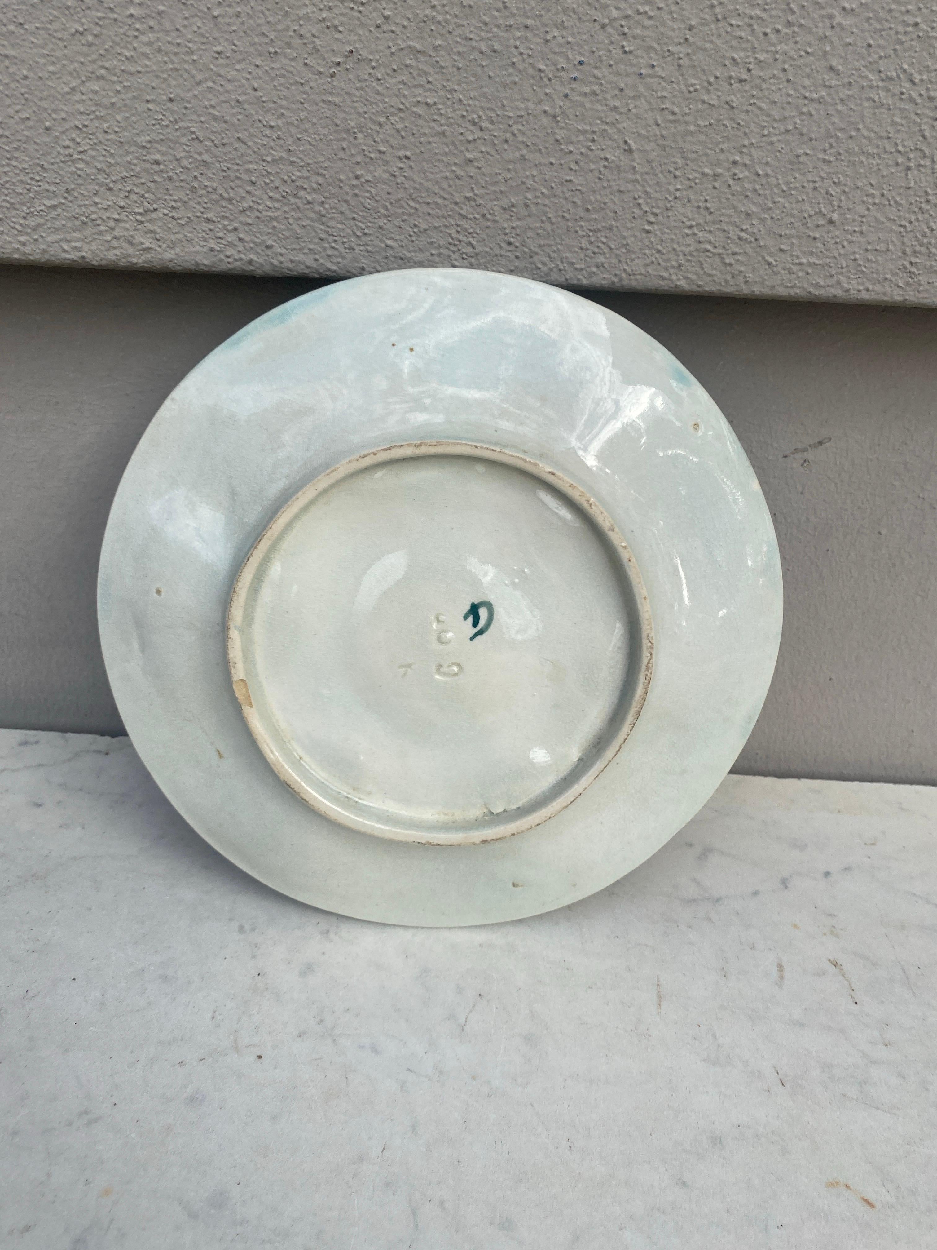 Plato de ostra de mayólica francesa con limón Circa 1890 Victoriano