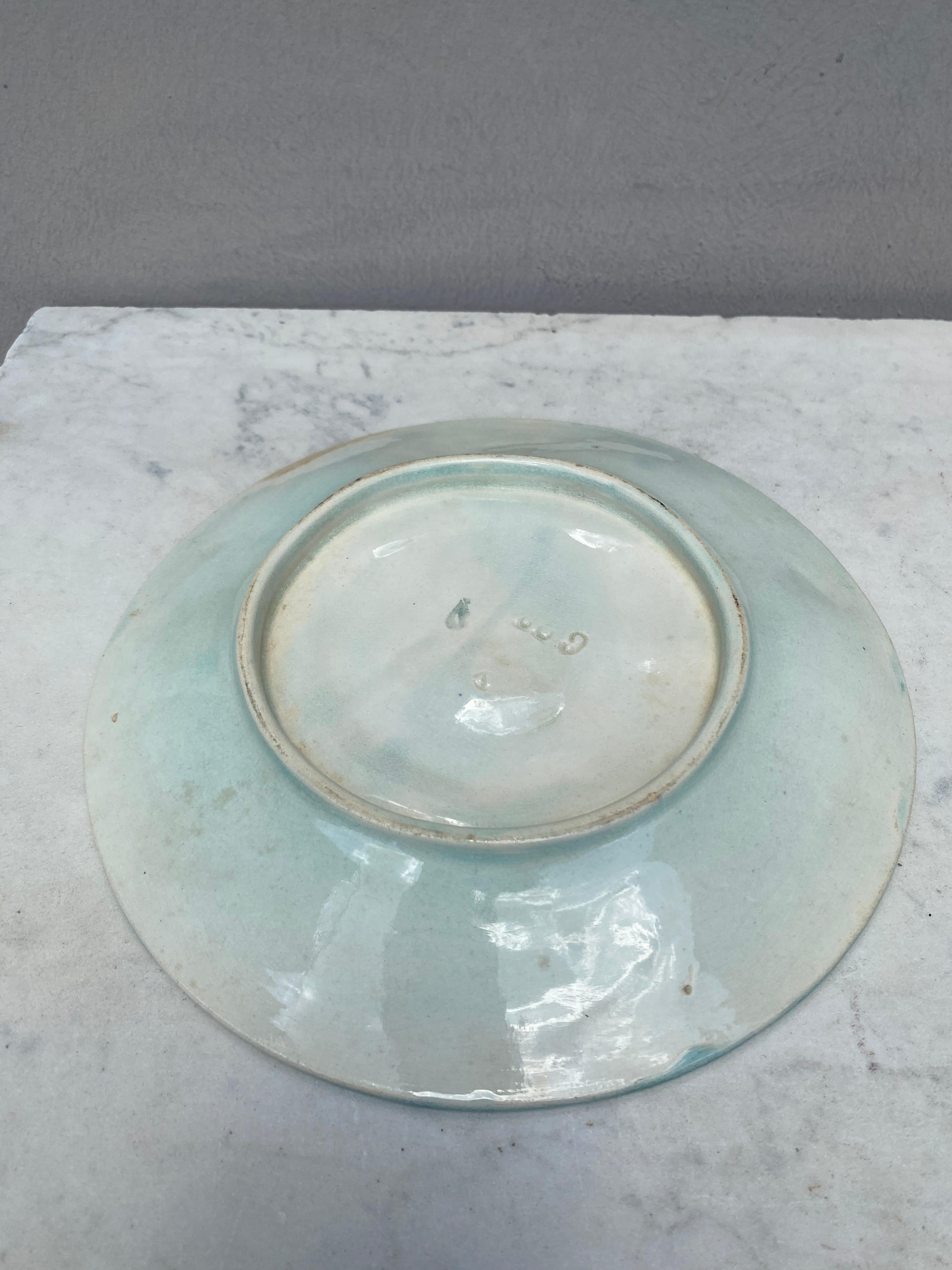 Plato de ostra de mayólica francesa con limón Circa 1890 Victoriano en venta
