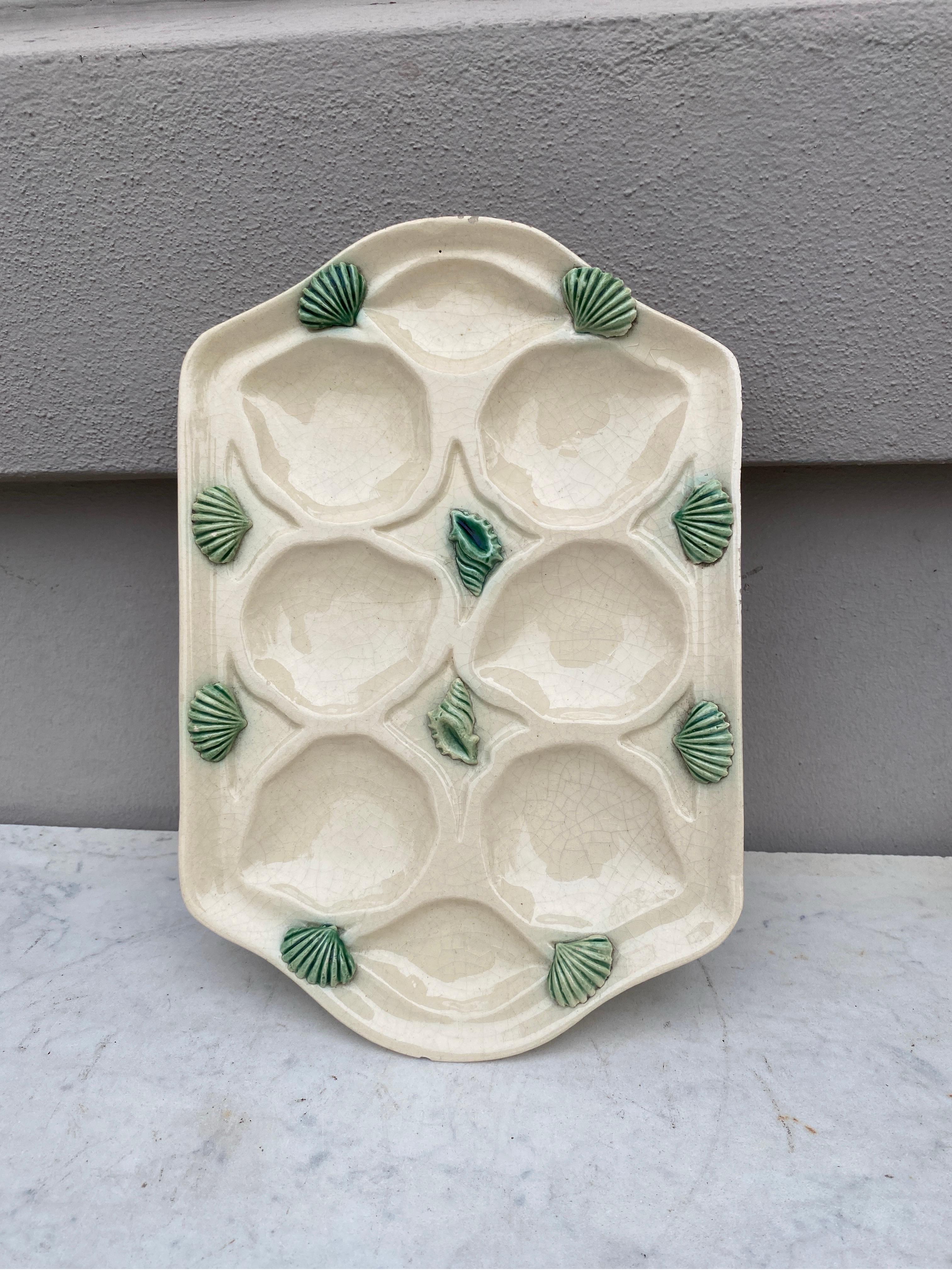 French Majolica Oyster Platter signed Manufacture of Mougins, circa 1950.
Decorated with shells.